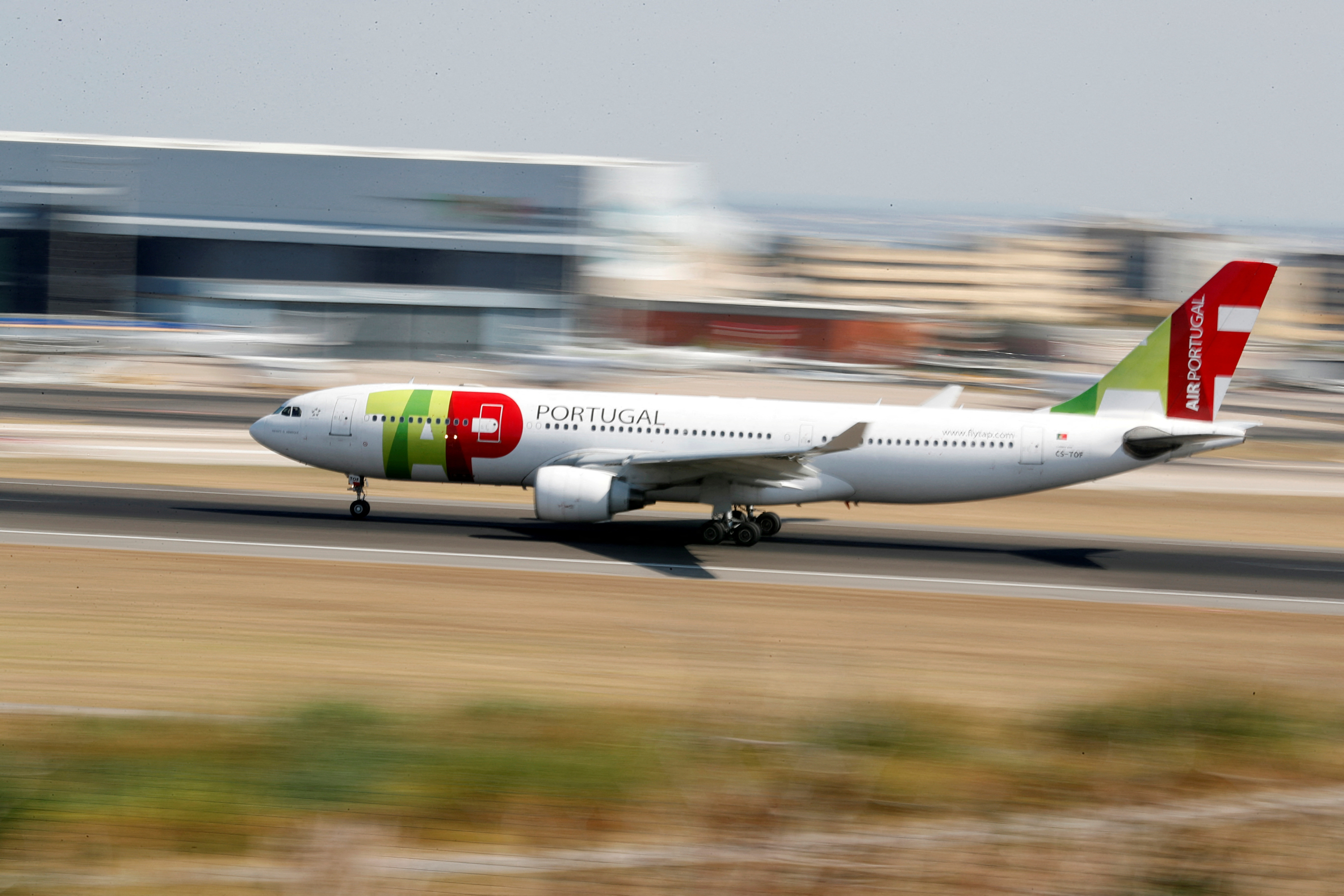 A TAP Air Portugal Airbus A330 plane lands at Lisbon's airport