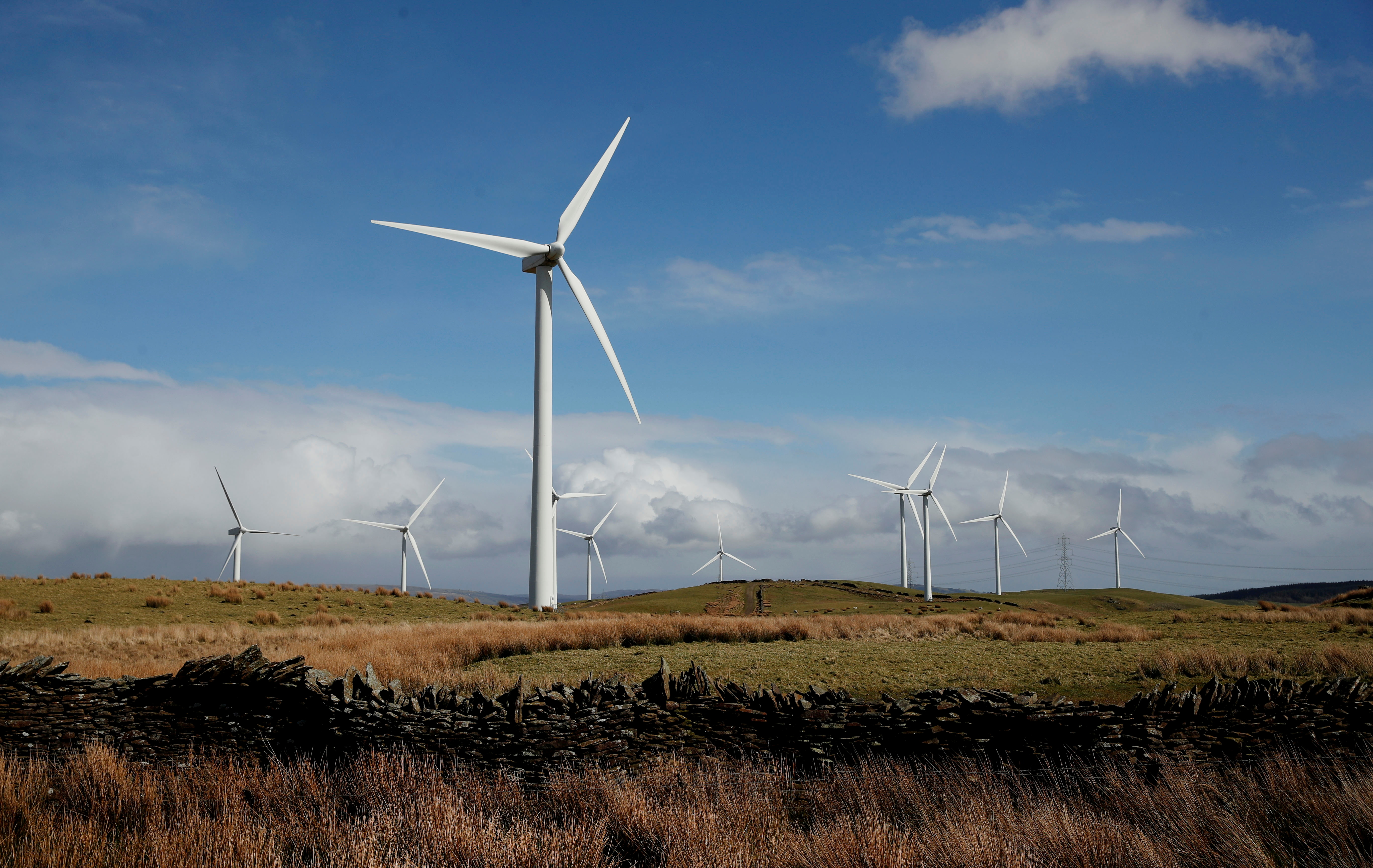 Wind turbines are seen at Mynydd Portref Wind Farm near Hendreforgan in South Wales