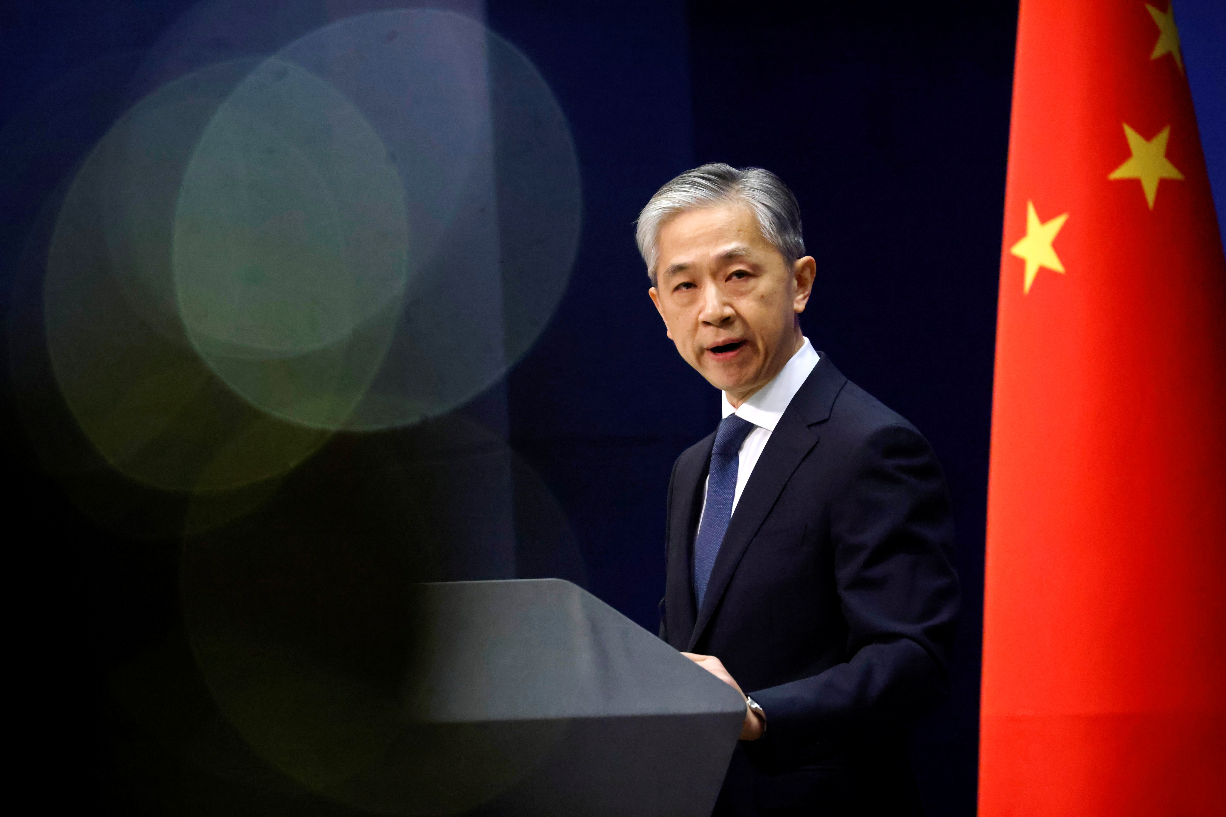 Chinese Foreign Ministry spokesman Wang Wenbin attends a news conference in Beijing