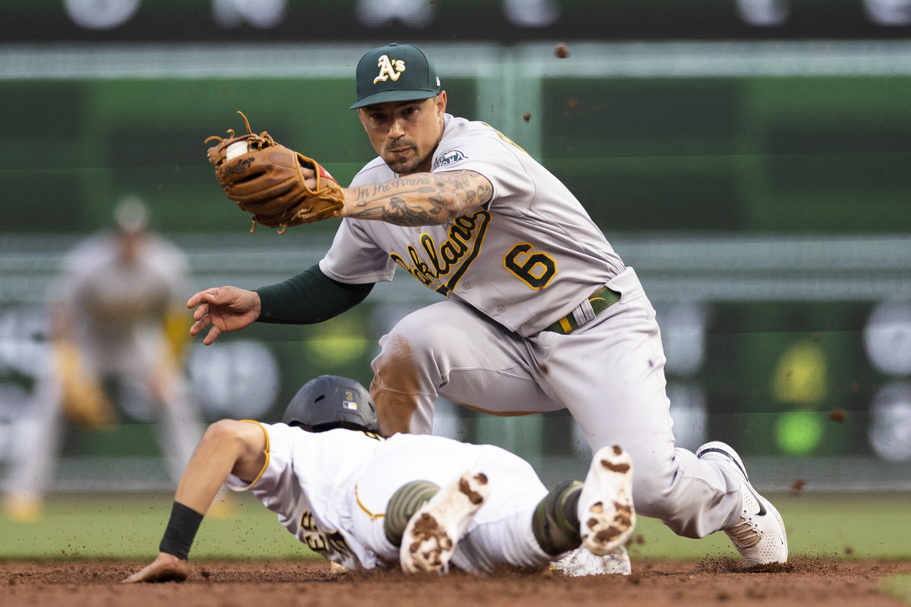 Pirates scrape out victory, hand A's 15th straight road loss