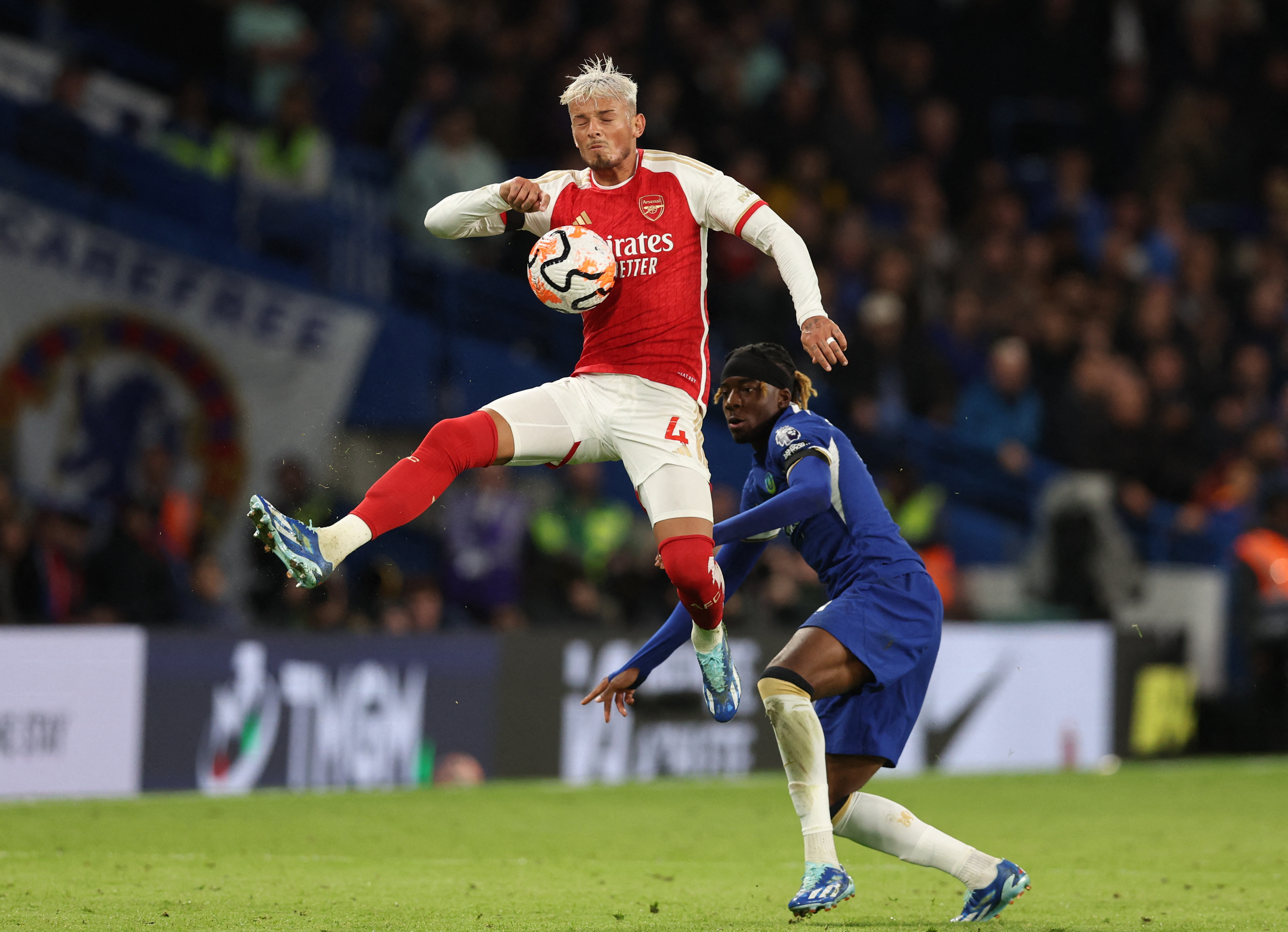 Arsenal fight back from two goals down to draw at Chelsea | Reuters