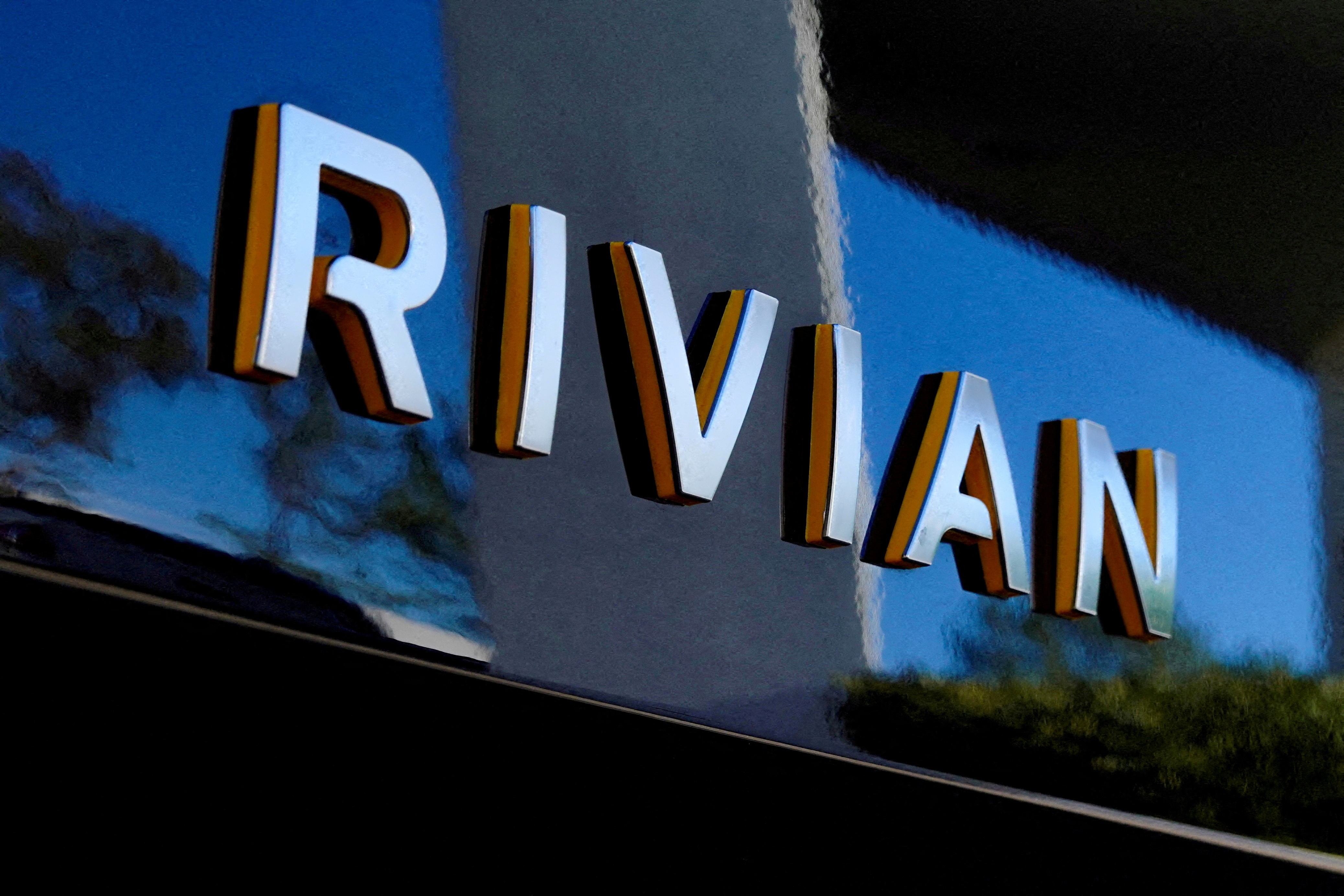 Rivian's logo on an electric SUV vehicles in San Diego, California, U.S.