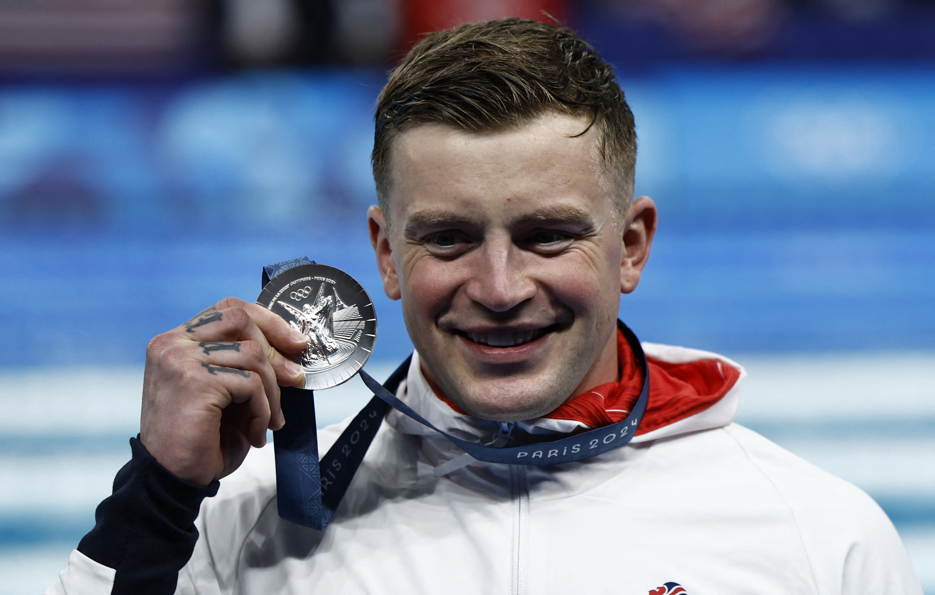 Swimming - Men's 100m Breaststroke Victory Ceremony