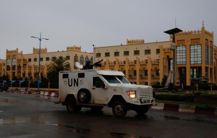 A U.N. vehicle patrols the streets before the polls open for the presidential election in Bamako