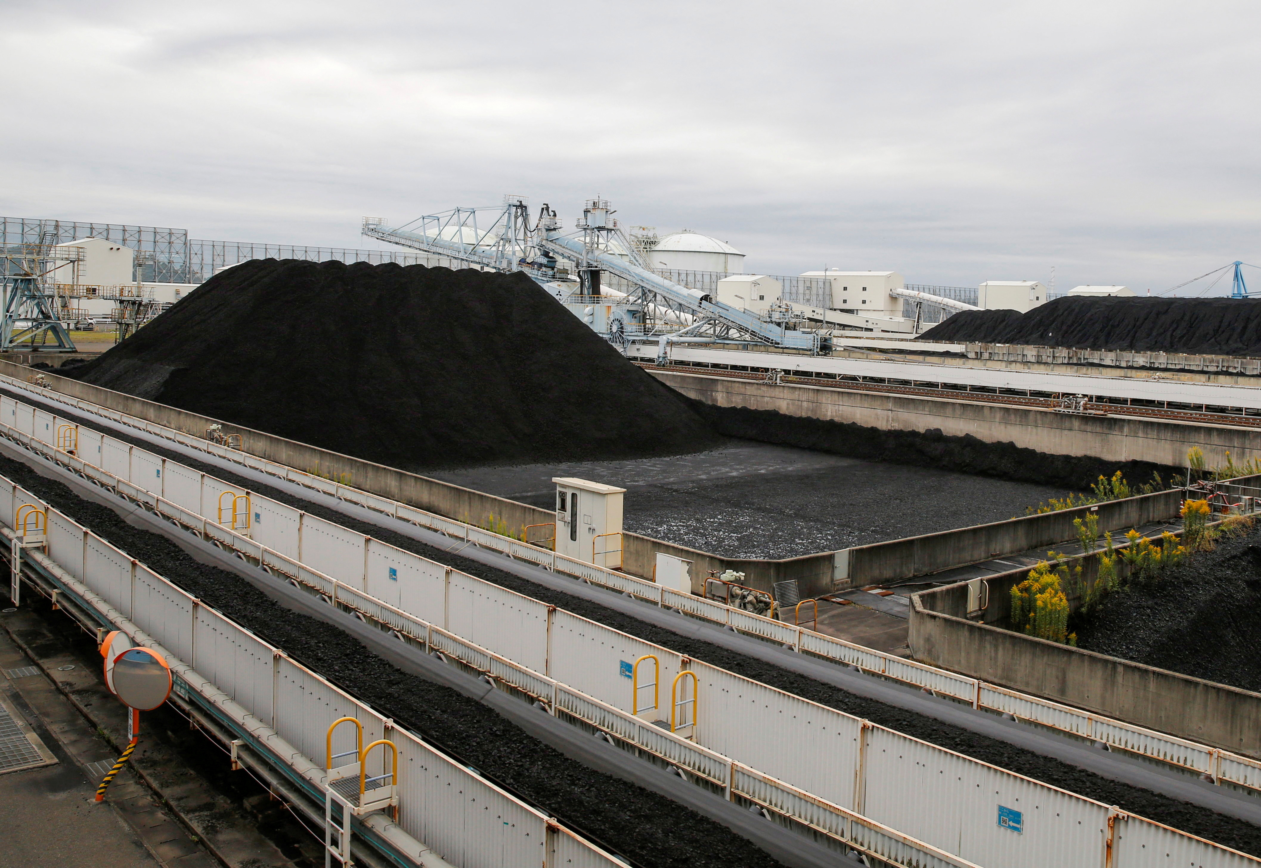Coal piles are seen at JERA's Hekinan thermal power station in Hekinan, central Japan
