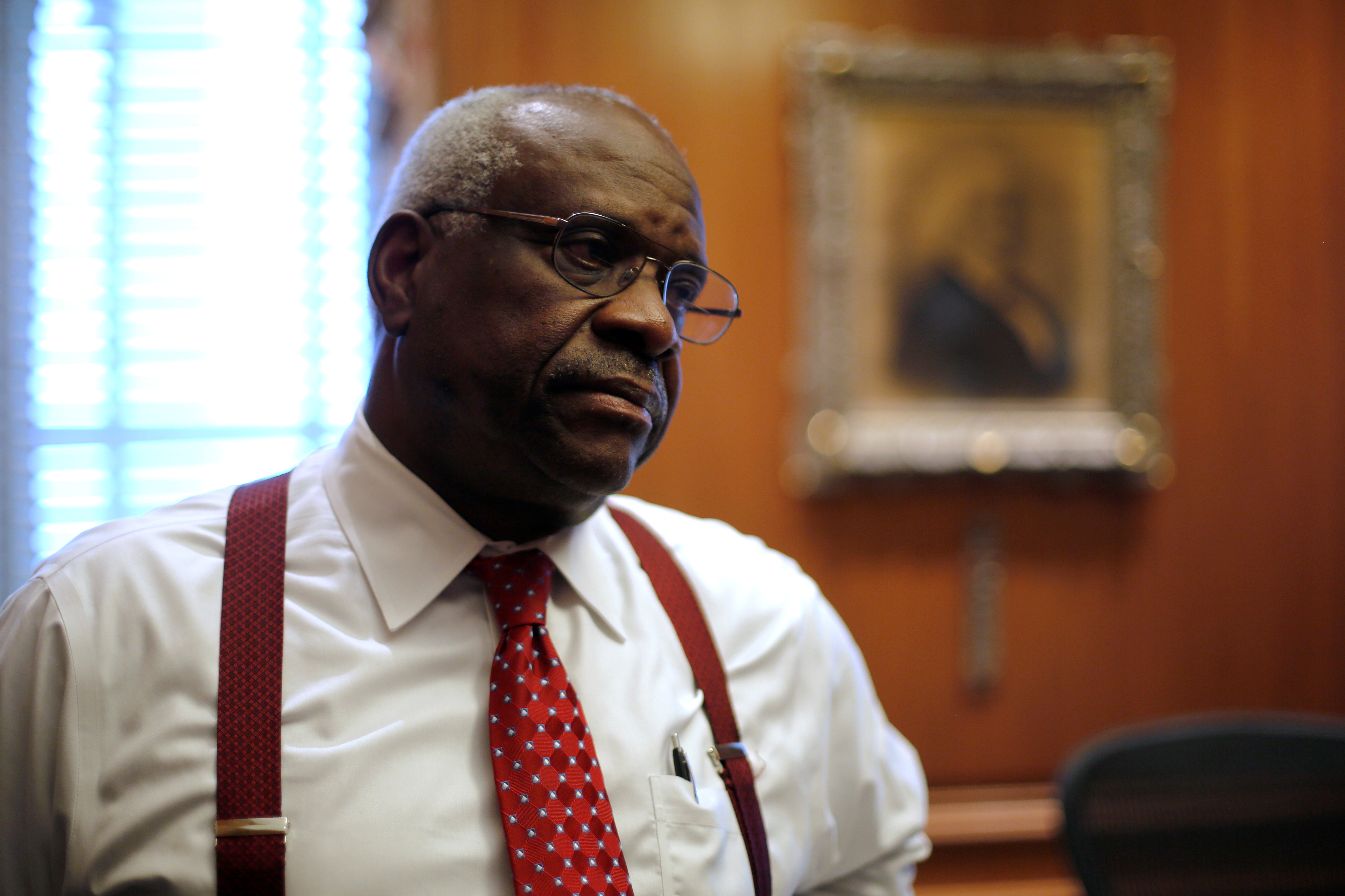 U.S. Supreme Court Justice Thomas is seen in his chambers at the U.S. Supreme Court building in Washington