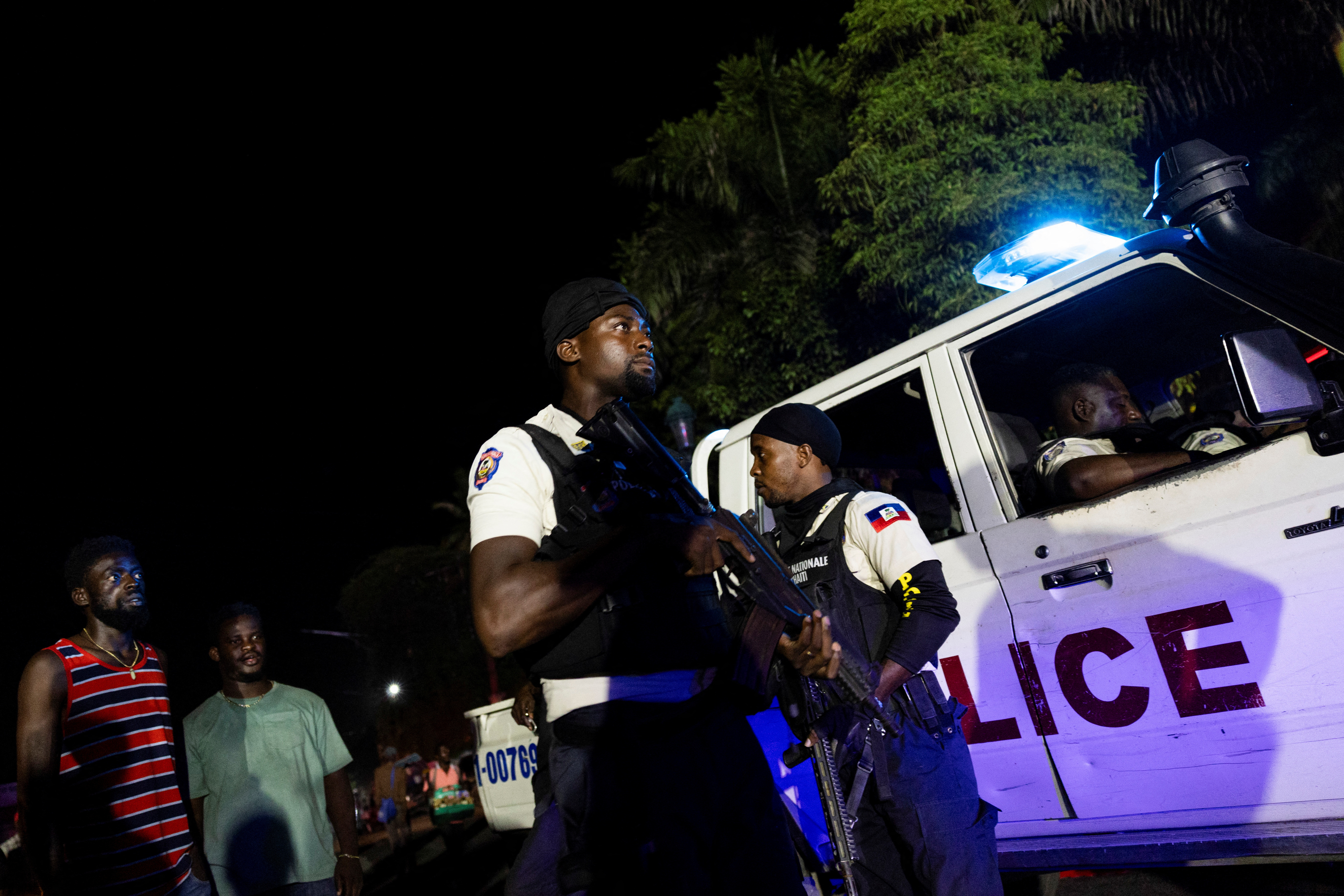 Kenyan police arrive as part of a peacekeeping mission in Haiti