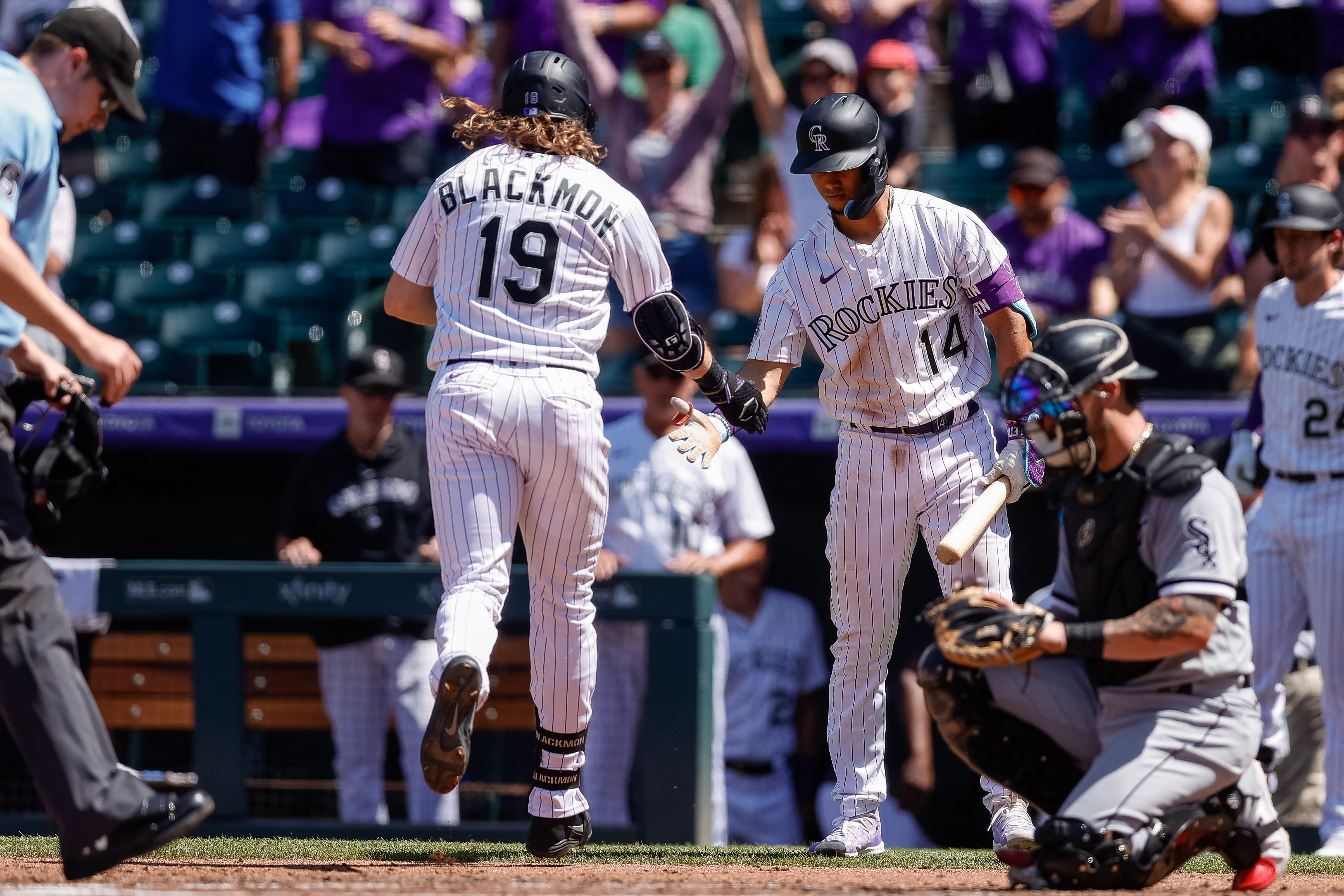 Chicago White Sox third baseman Yoan Moncada (10) swings at the pitch in an  MLB baseball game against the Colorado Rockies, Sunday, Aug. 20, 2023. The  White Sox defeated the Rockies 10-5