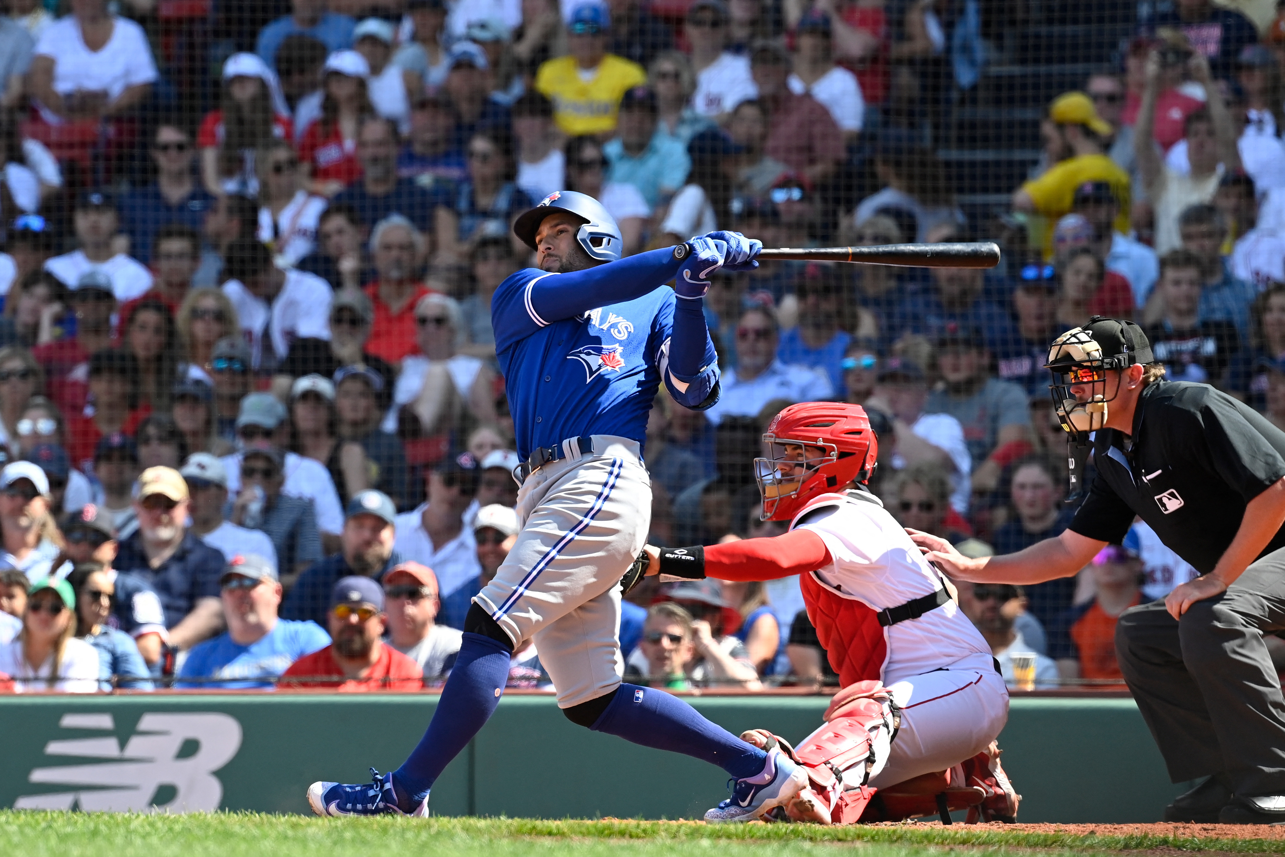 Schneider, Chapman lead the Blue Jays past Red Sox 13-1