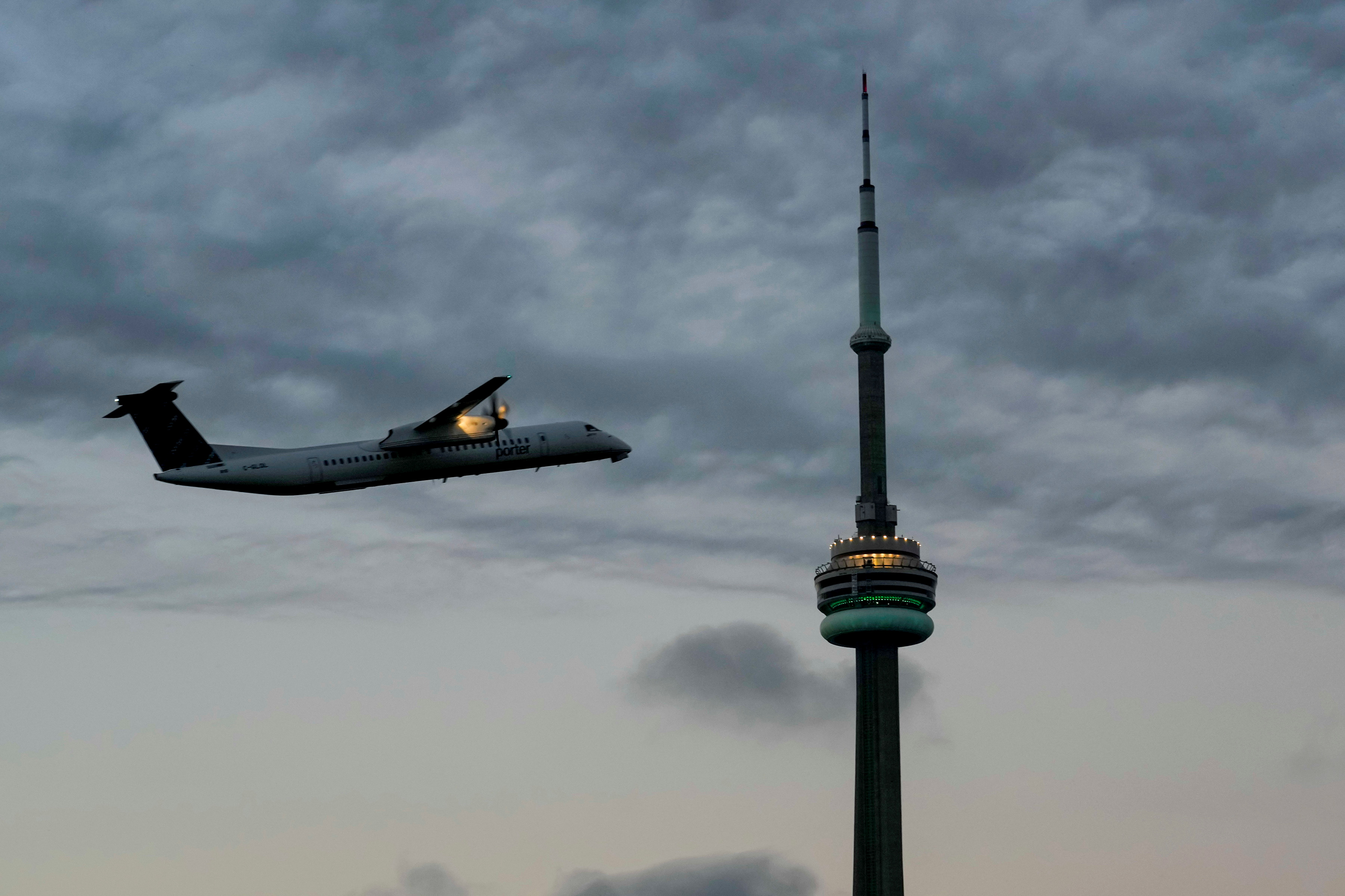 An airplane takes off from Billy Bishop Airport after Canada's Prime Minister Justin Trudeau announced that passengers will require COVID-19 vaccination for air, ship and interprovincial train services, in Toronto, Ontario, Canada October 6, 2021.  REUTERS/Carlos Osorio