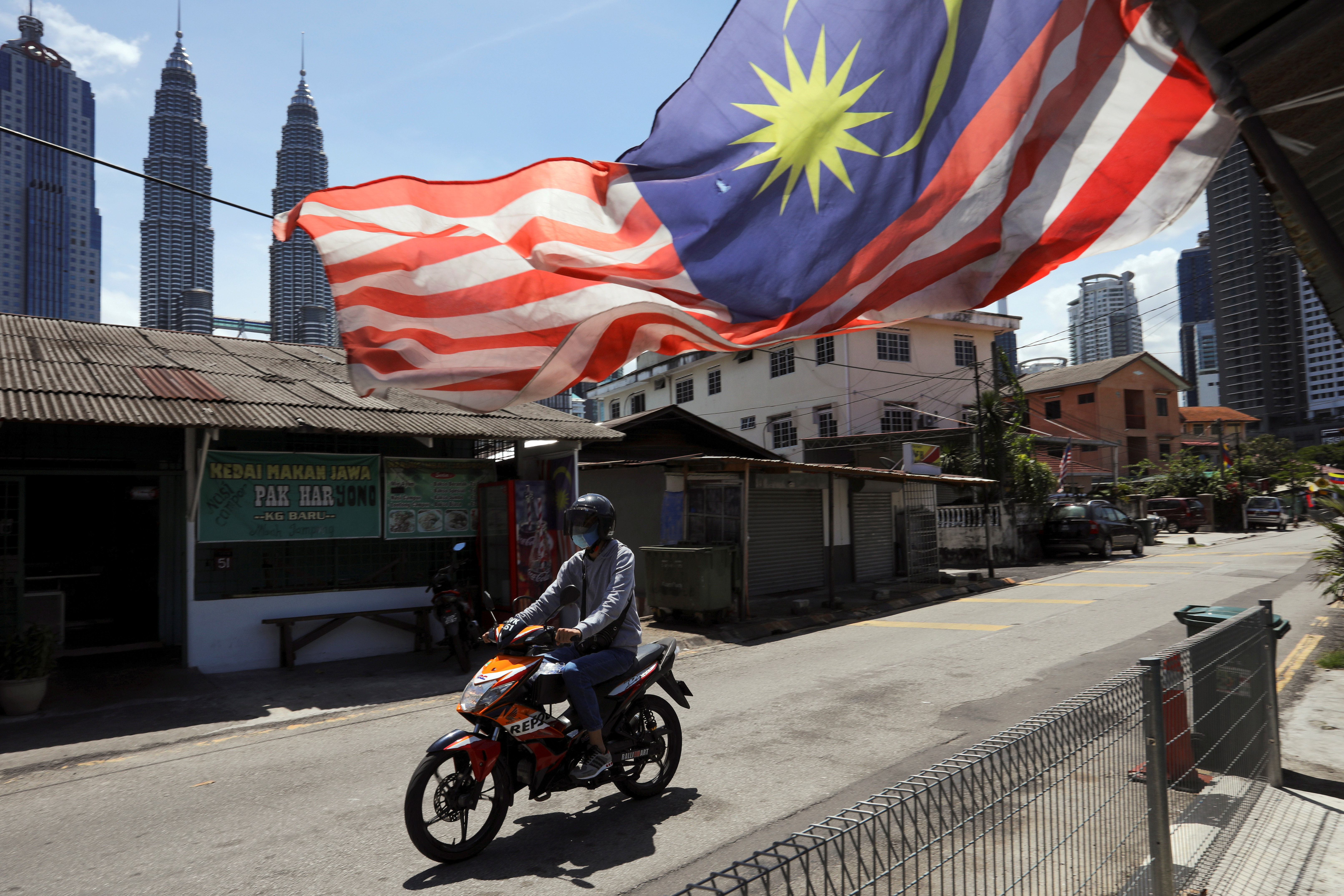 Malaysia's economy likely picked up pace in Q1, China slowdown a worry |  Reuters