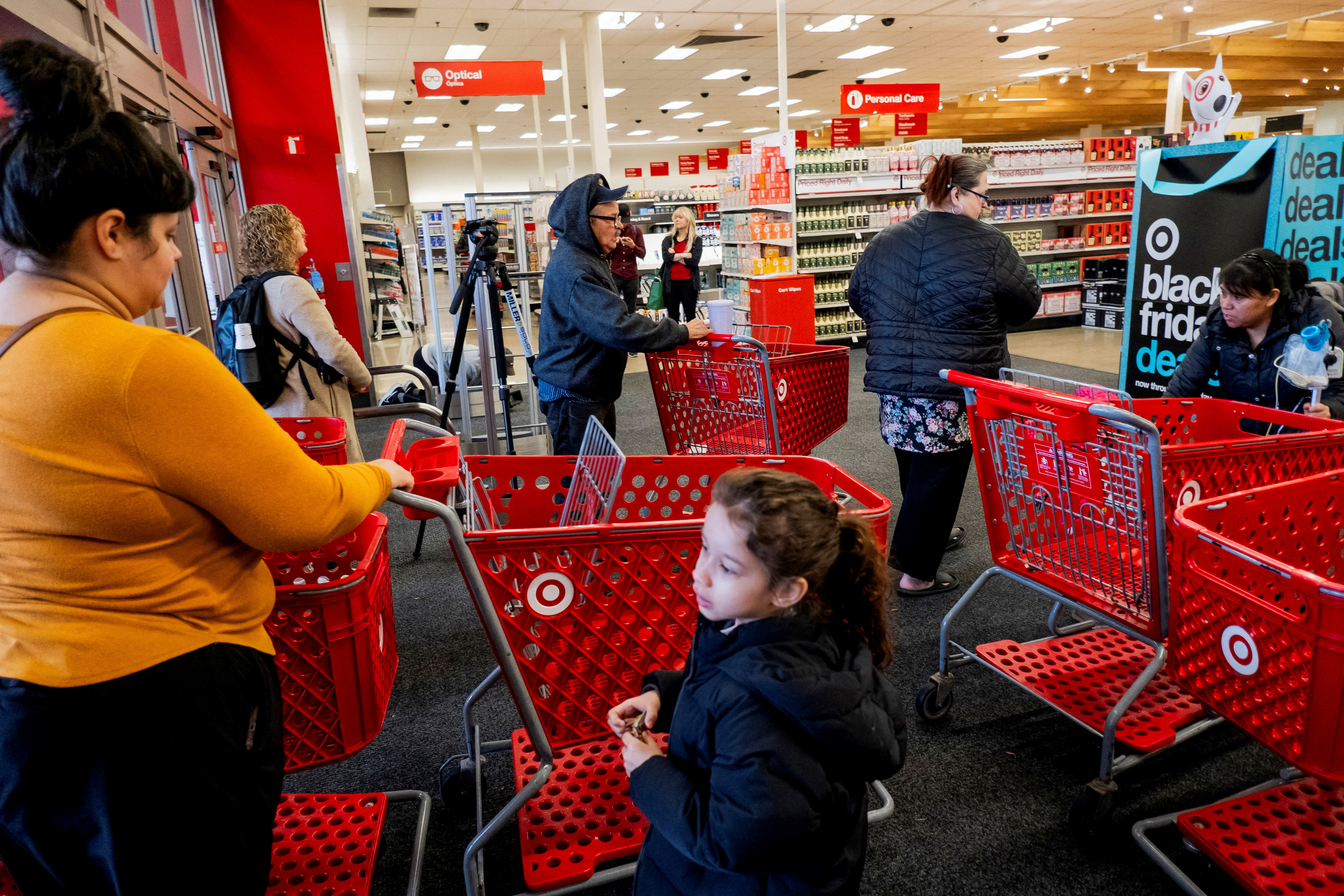Shoppers converge in a Target store ahead of the Thanksgiving holiday
