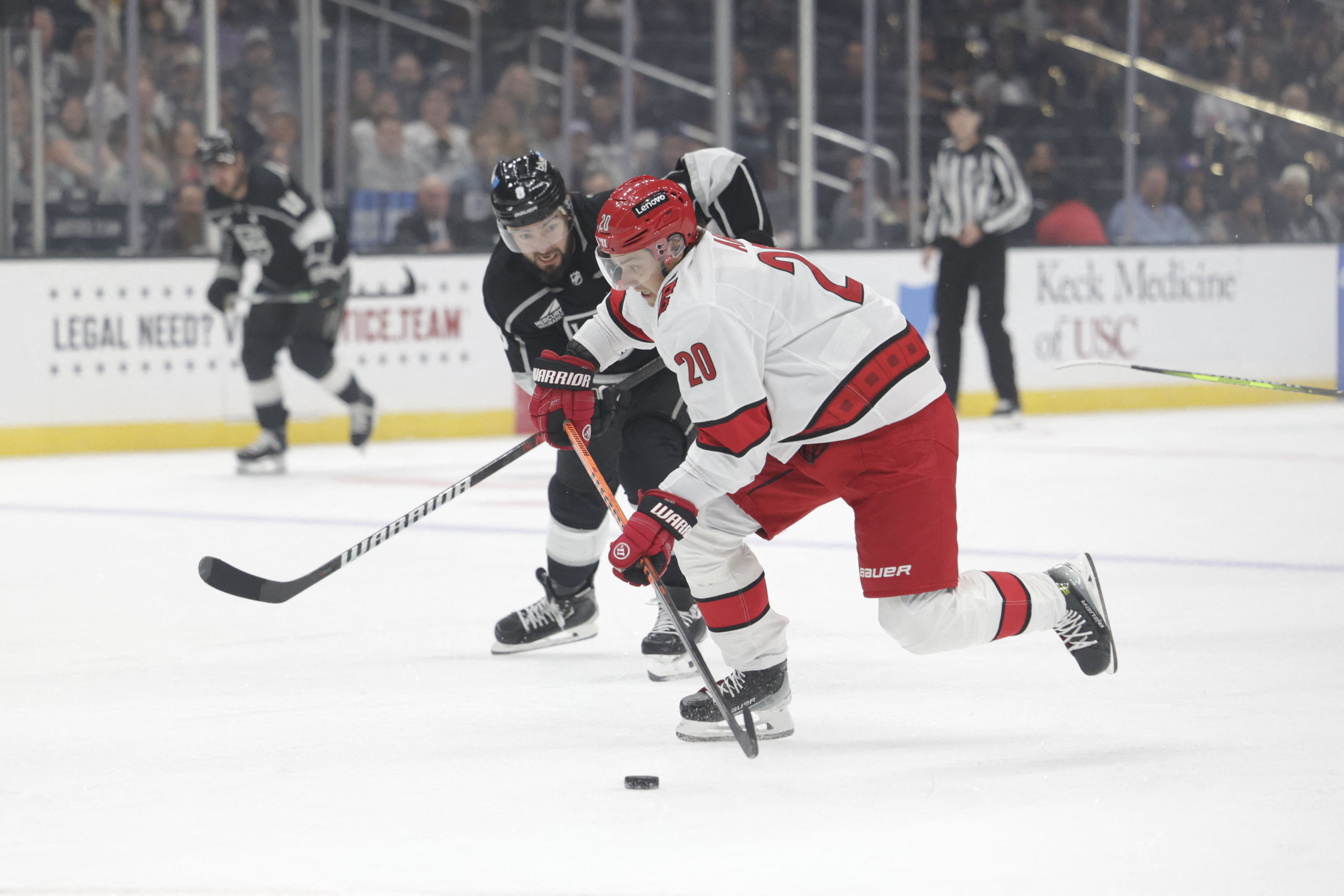 Hurricanes blow early lead, beat Kings in 9-round shootout