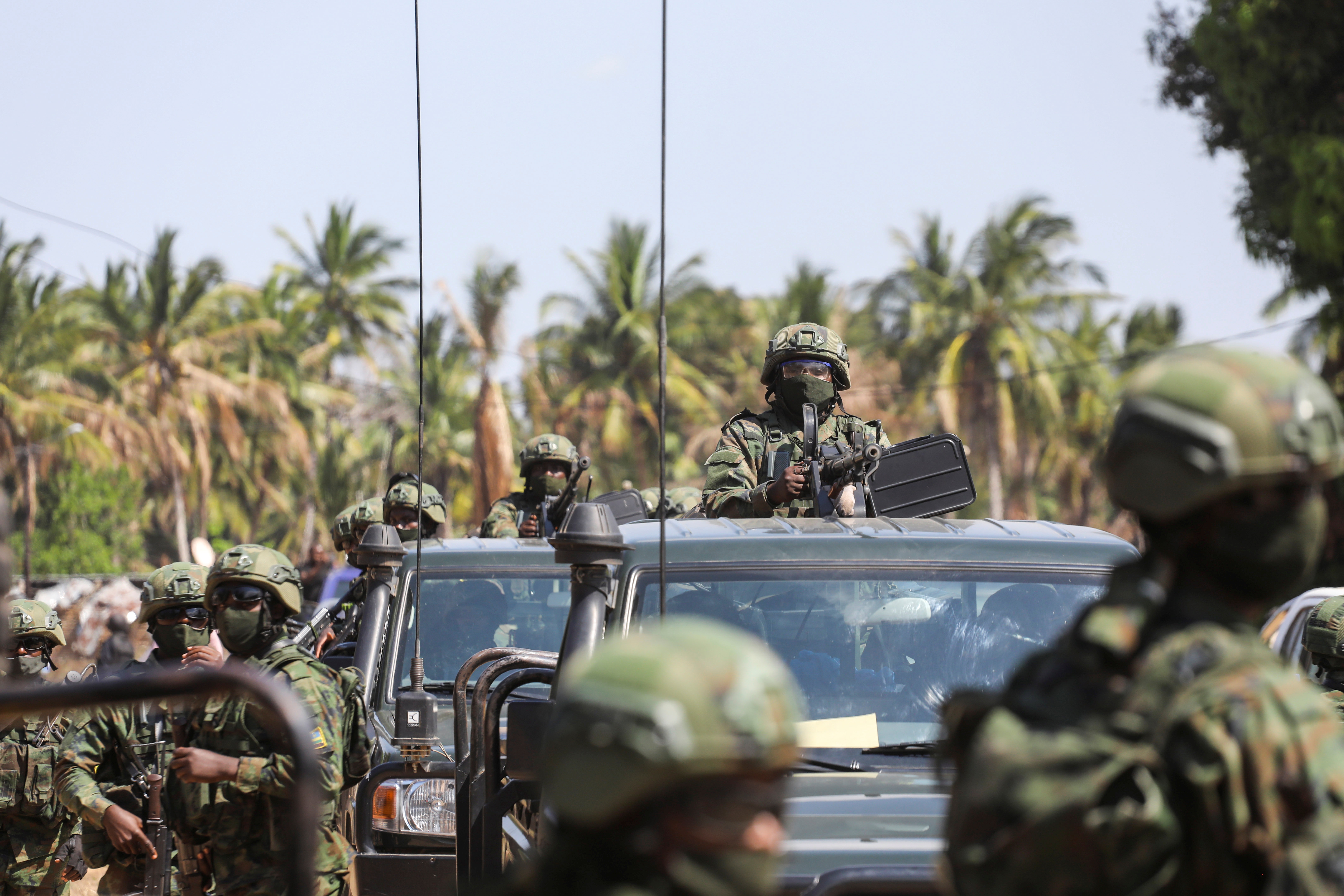 Rwandan security forces take positions in the town of Mbau