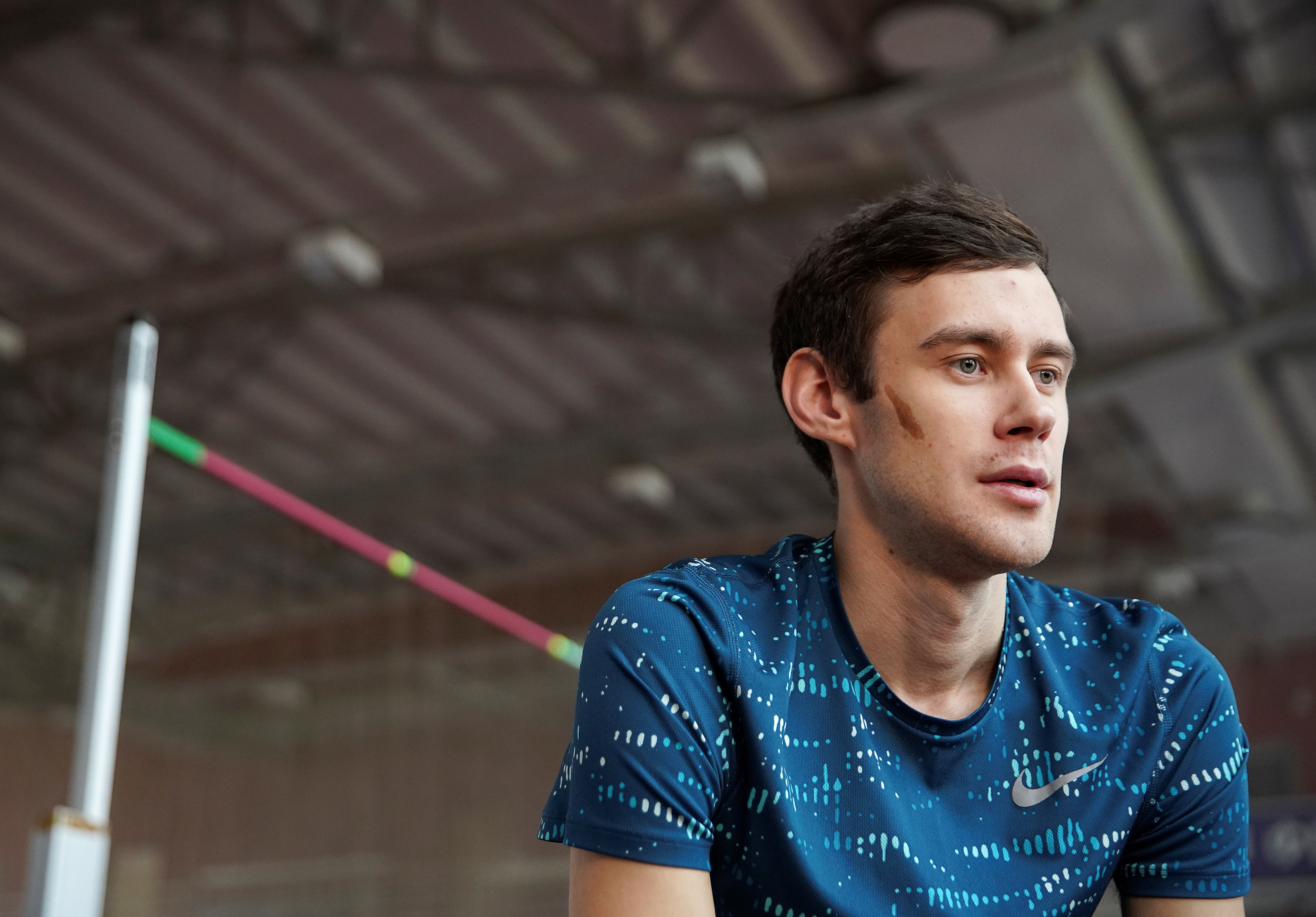Russian high jumper Danil Lysenko gives an interview in Moscow