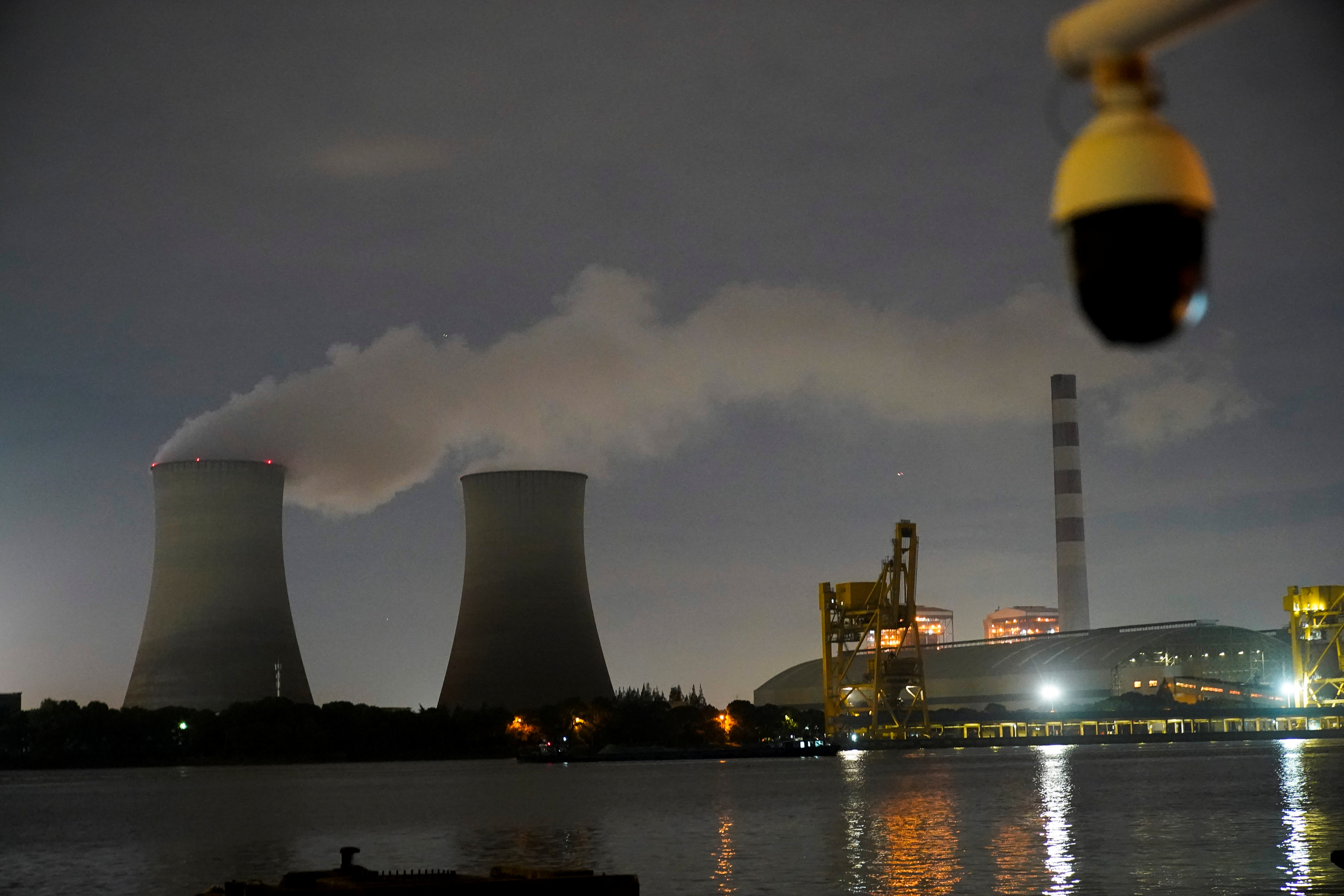 A surveillance camera is seen near a coal-fired power plant in Shanghai