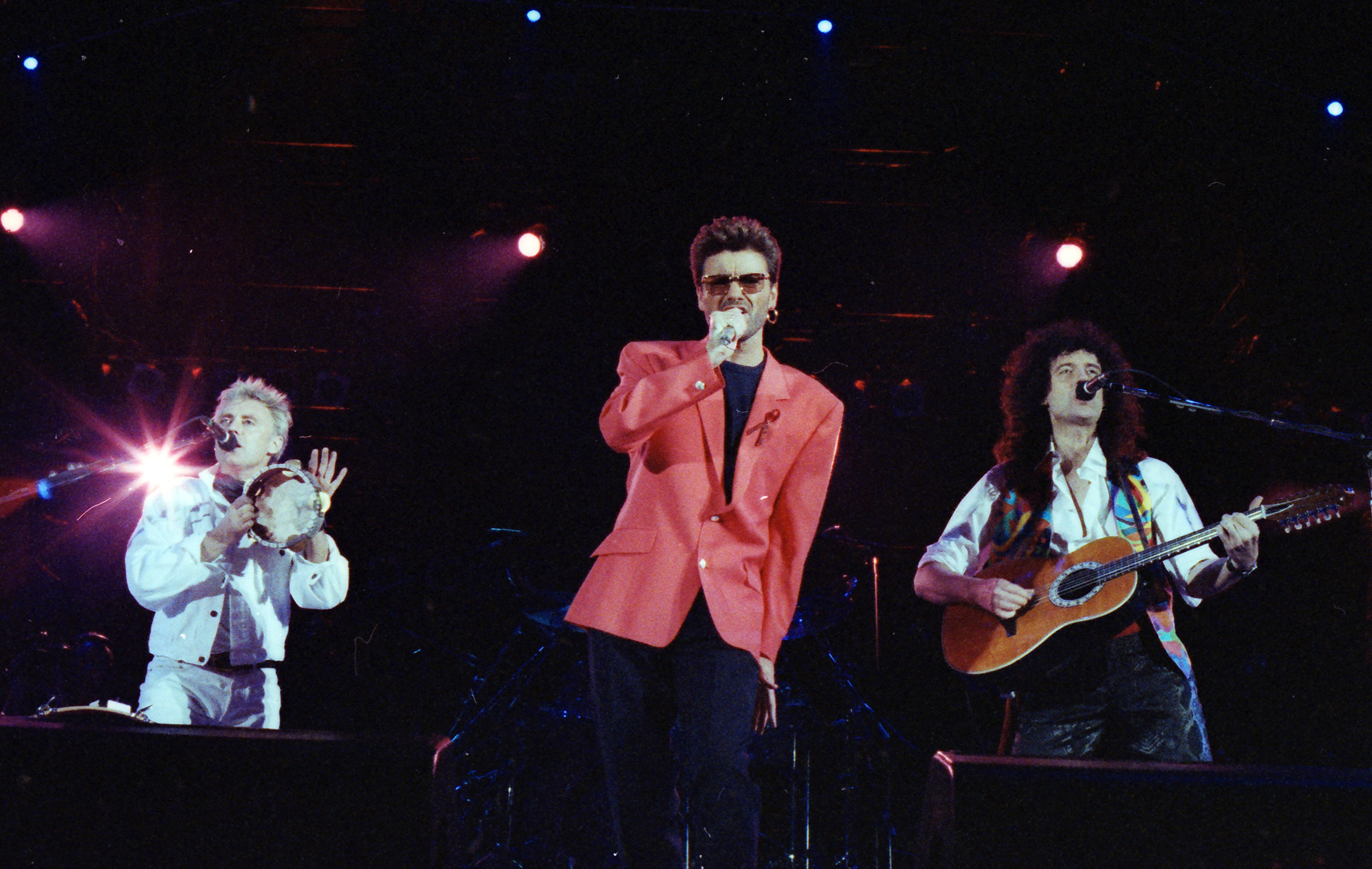Singer George Michael performs with Queen at the Freddie Mercury Tribute Concert for AIDS Awareness, at Wembley Stadium, in London