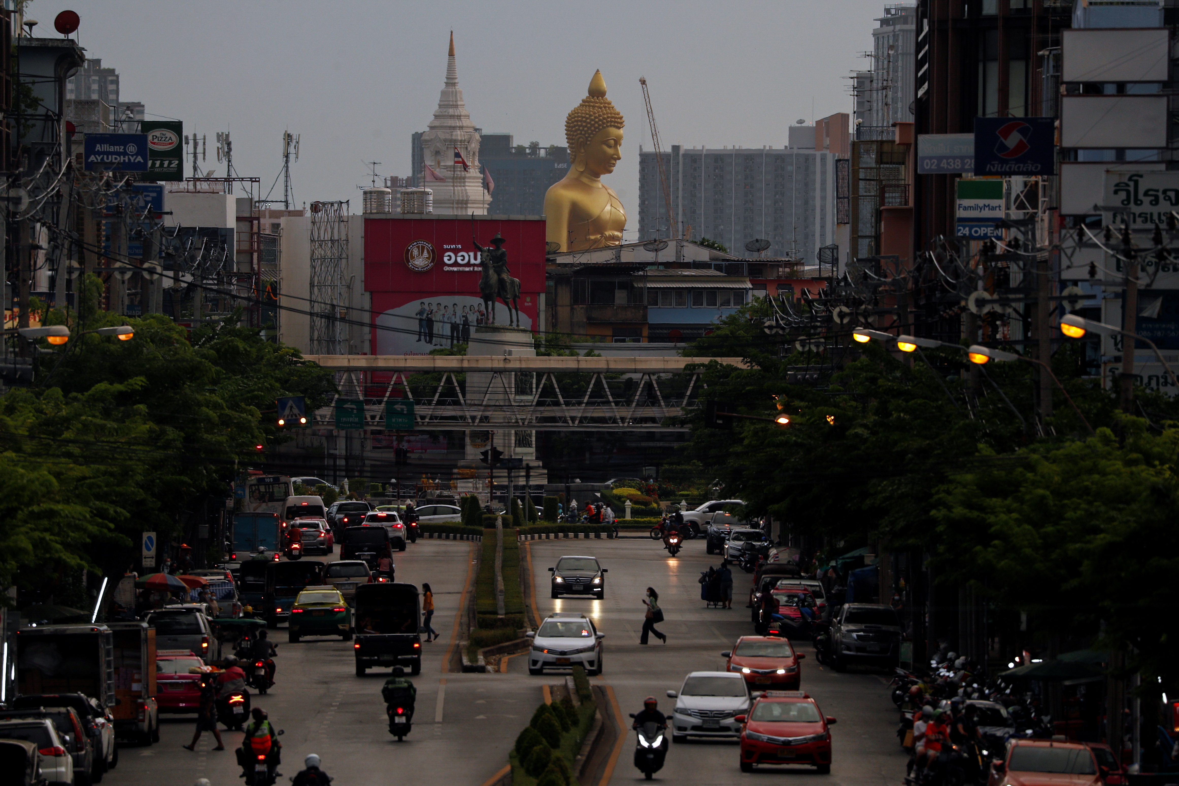 The giant Buddha statue of Wat Paknam Phasi Charoen temple is seen at the end of an avenue amid the coronavirus disease outbreak in Bangkok