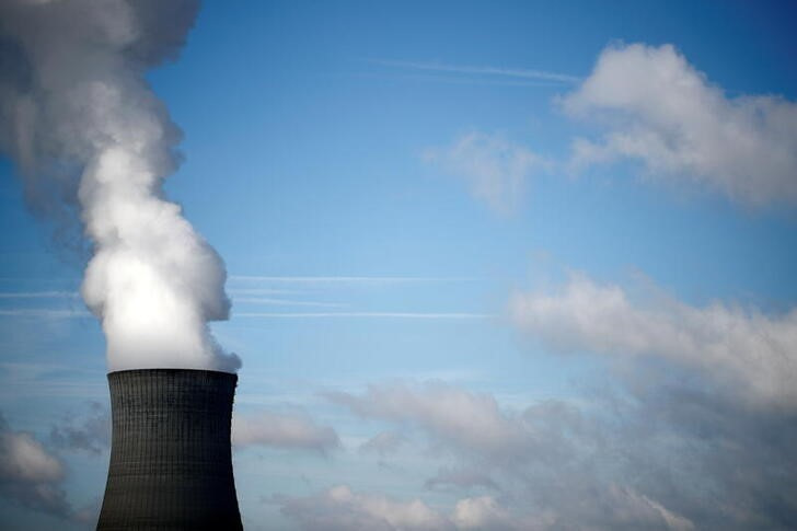 Steam rises from a cooling tower of the Electricite de France (EDF) nuclear power station in Dampierre-en-Burly