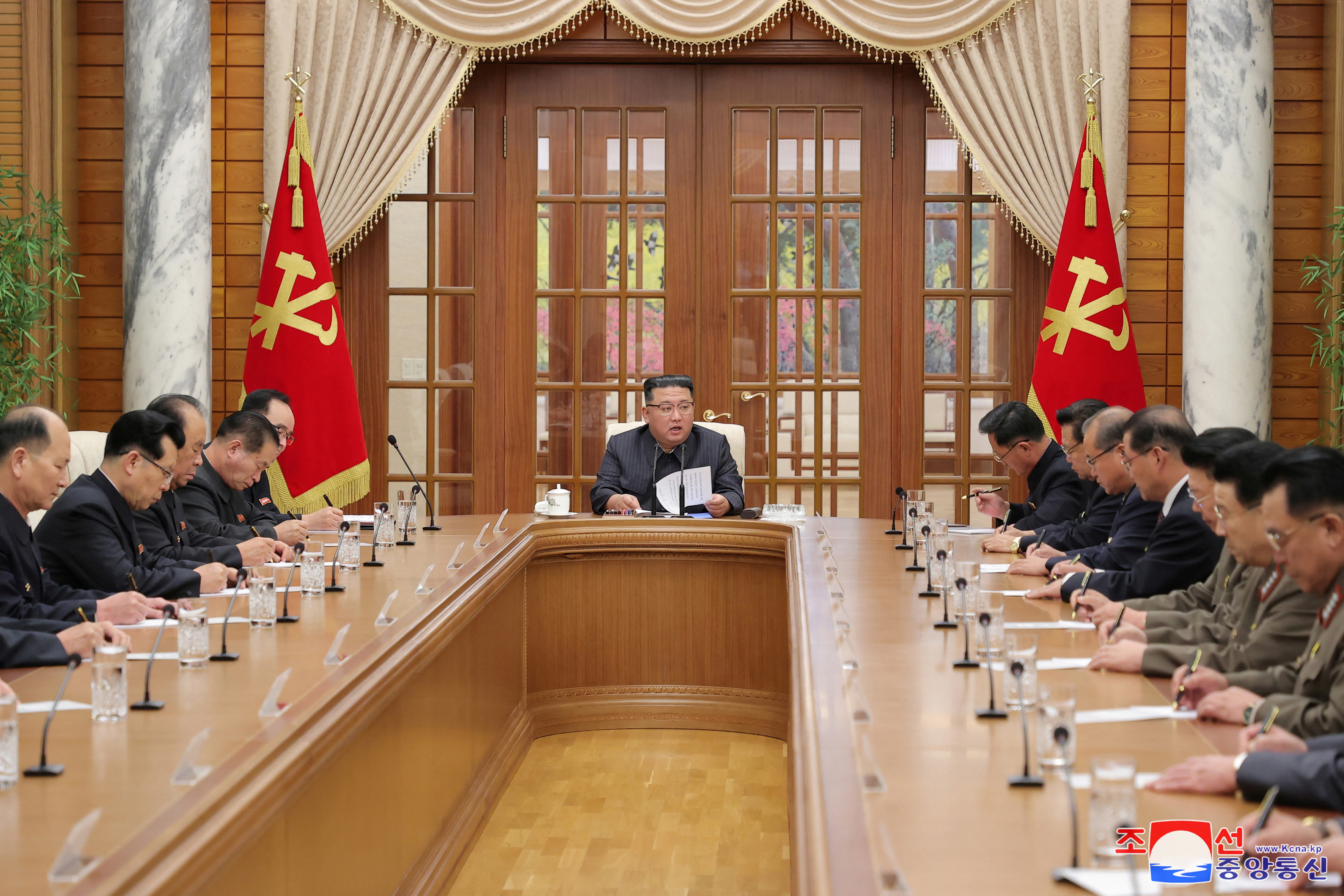 North Korean leader Kim Jong Un attends the 11th Meeting of the Political Bureau of the 8th Central Committee