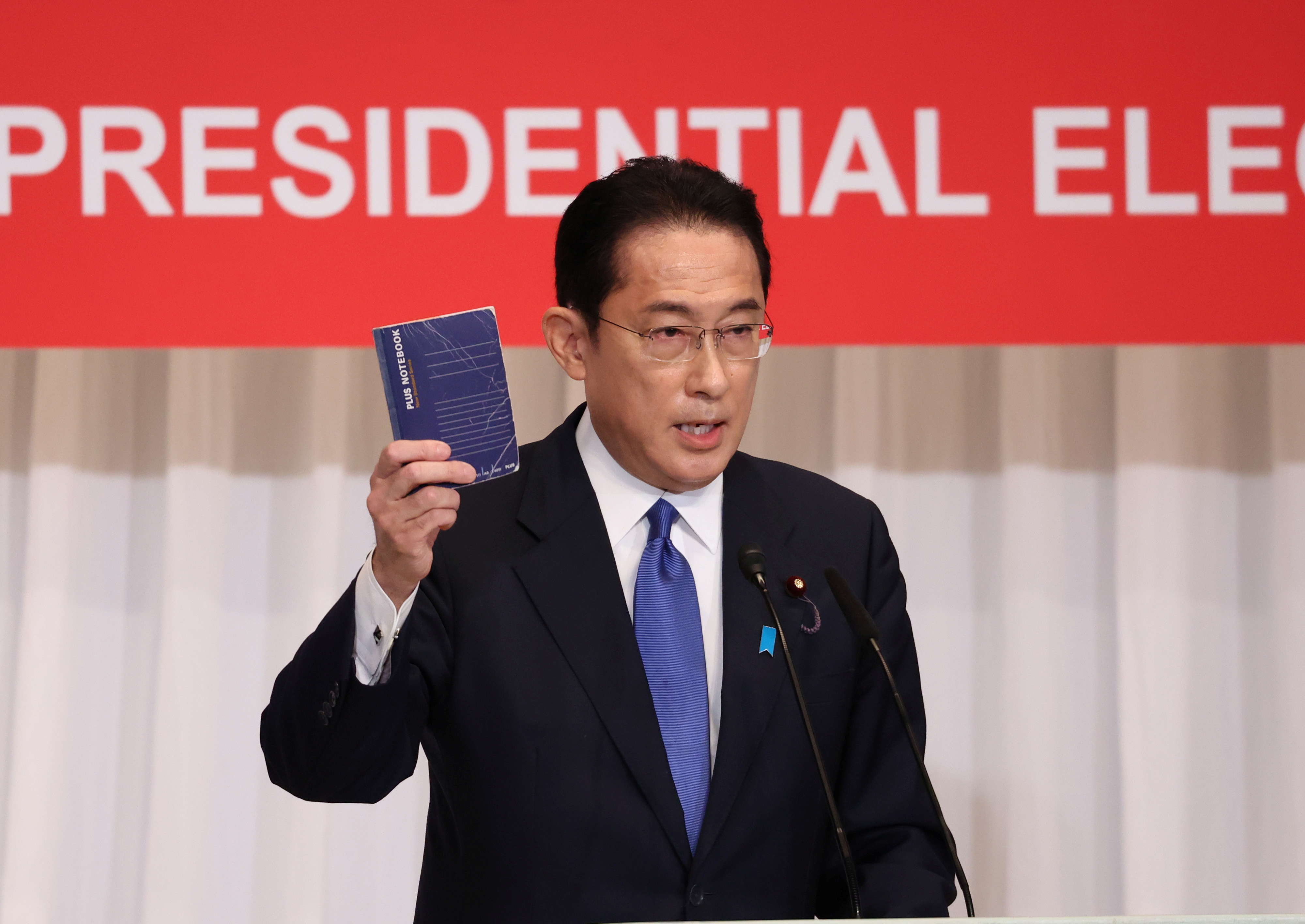 A candidate of the ruling Liberal Democratic Party (LDP) presidential election, former Foreign Minister Fumio Kishida delivers a campaign speech in Tokyo, Japan