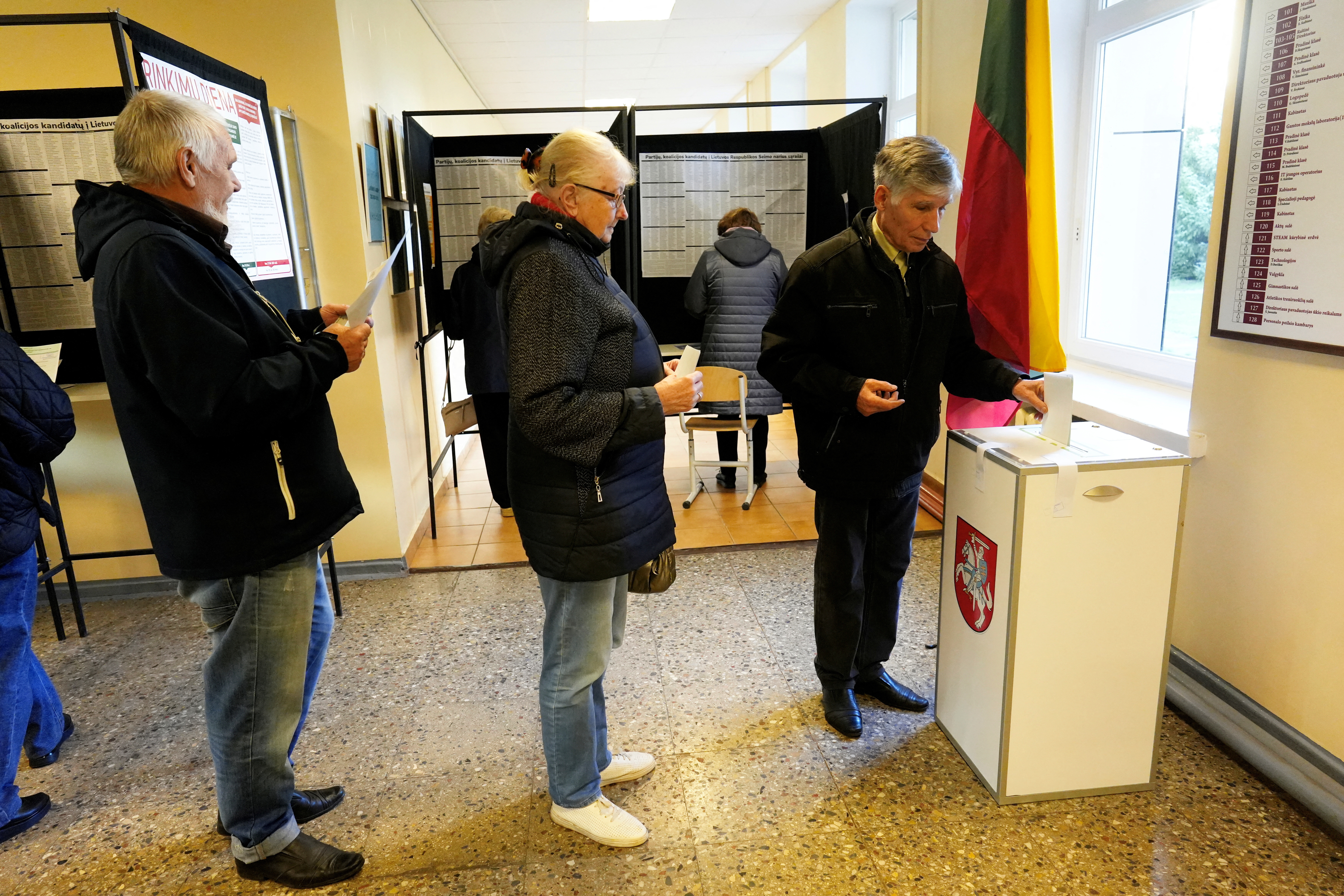 People vote during Lithuanian general election in Birzai