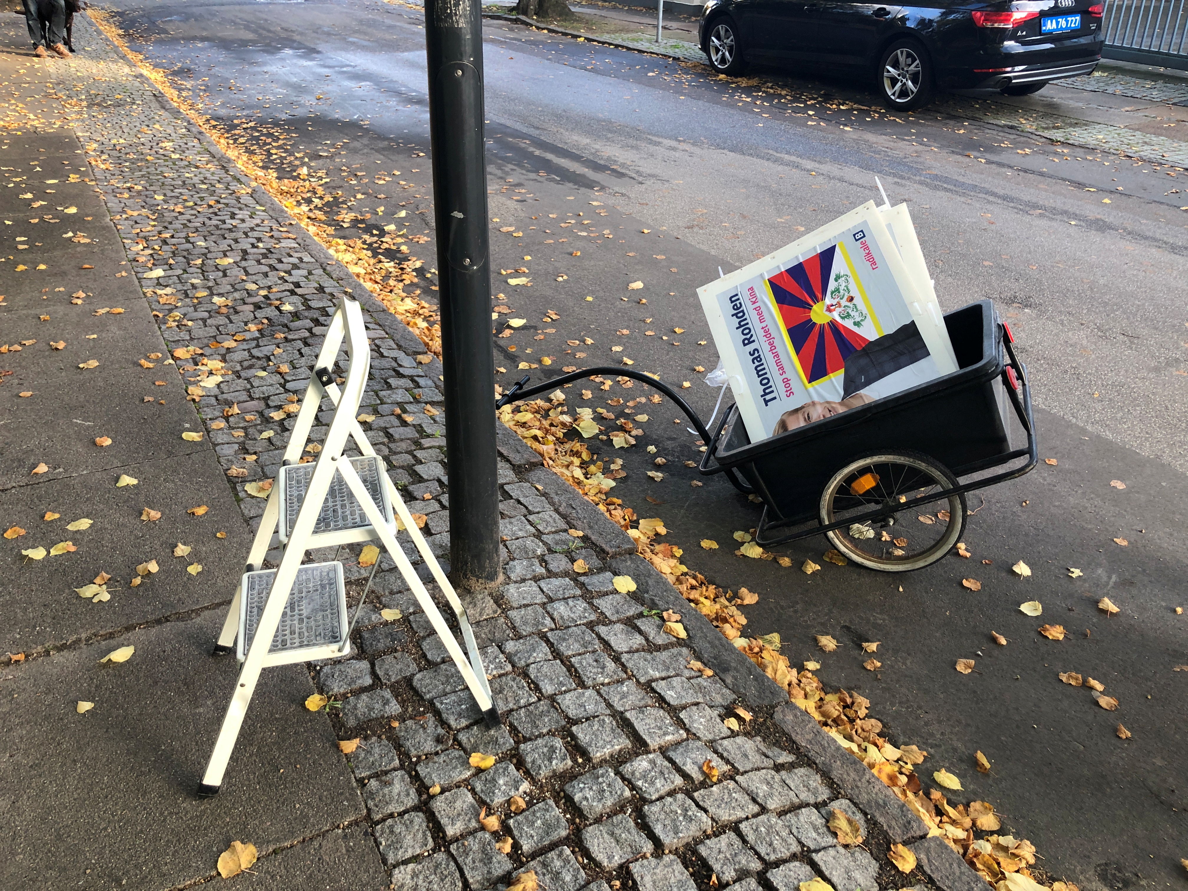 A trolley of a political candidate in upcoming local elections Thomas Rohden loaded with posters displaying him next to a Tibetan flag parks outside the Chinese embassy near Copenhagen, Denmark October 26, 2021.   REUTERS/Nikolaj Skydsgaard