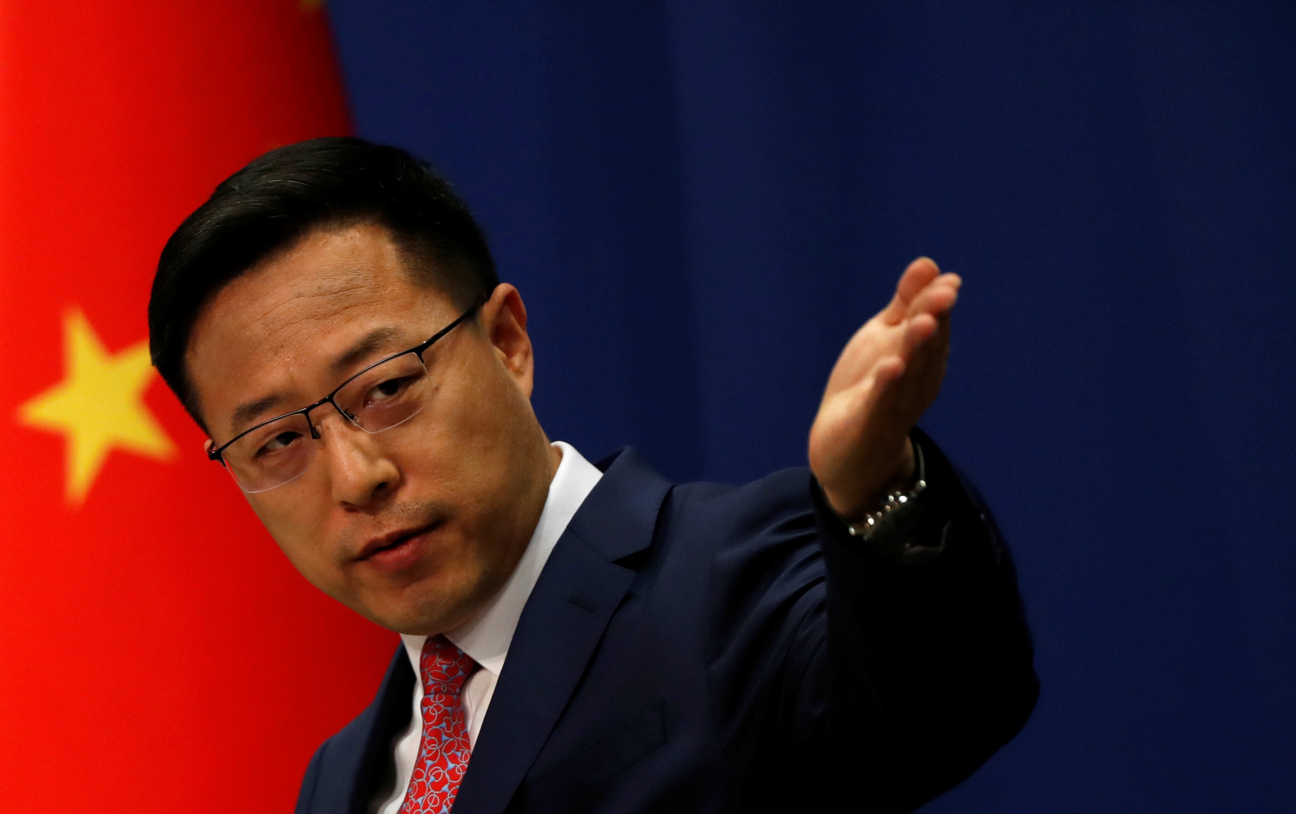 Chinese Foreign Ministry spokesman Zhao Lijian attends a news conference in Beijing