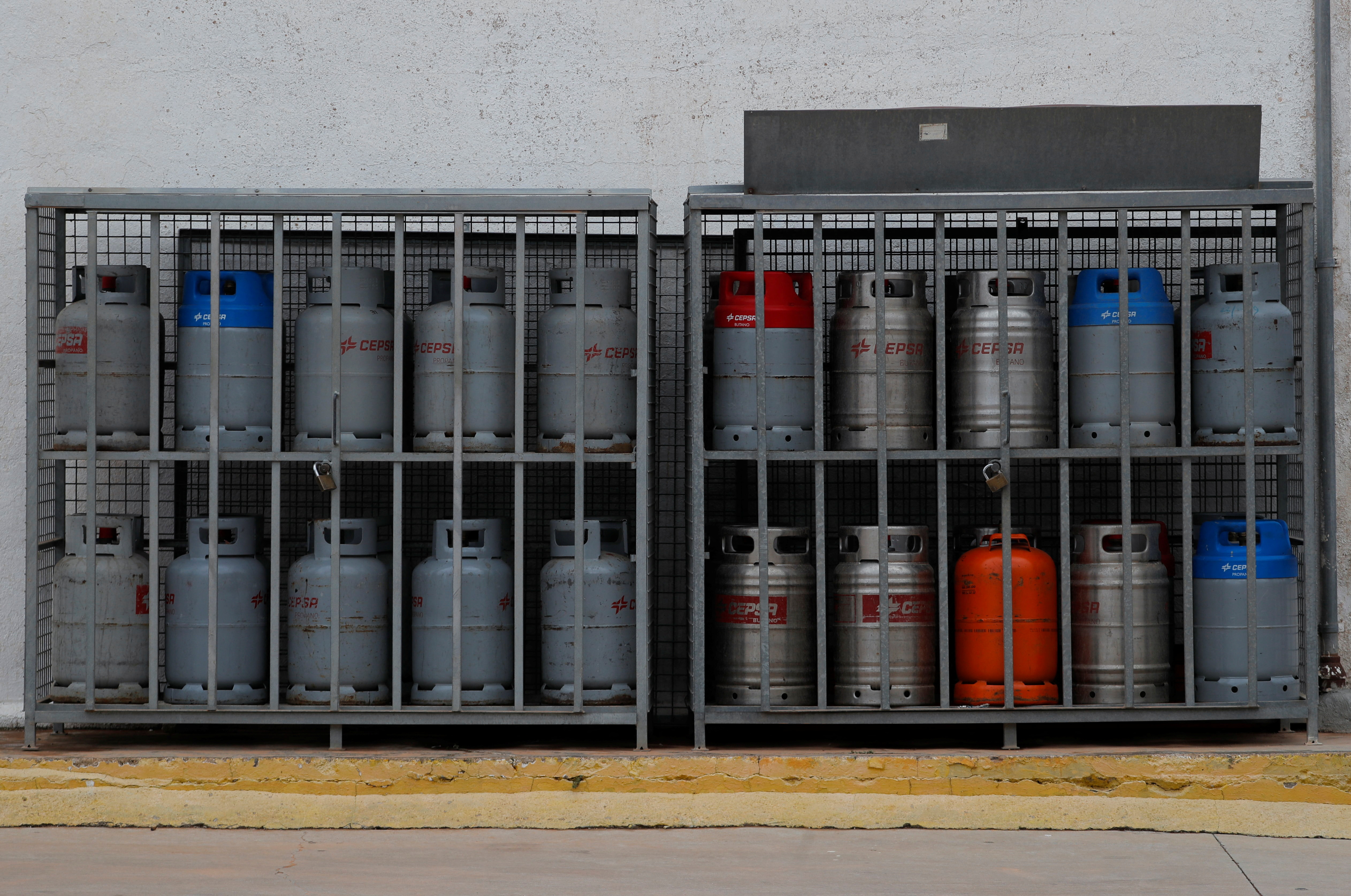 Butane and propane cylinders are stored at a Cepsa petrol station in Cuevas del Becerro