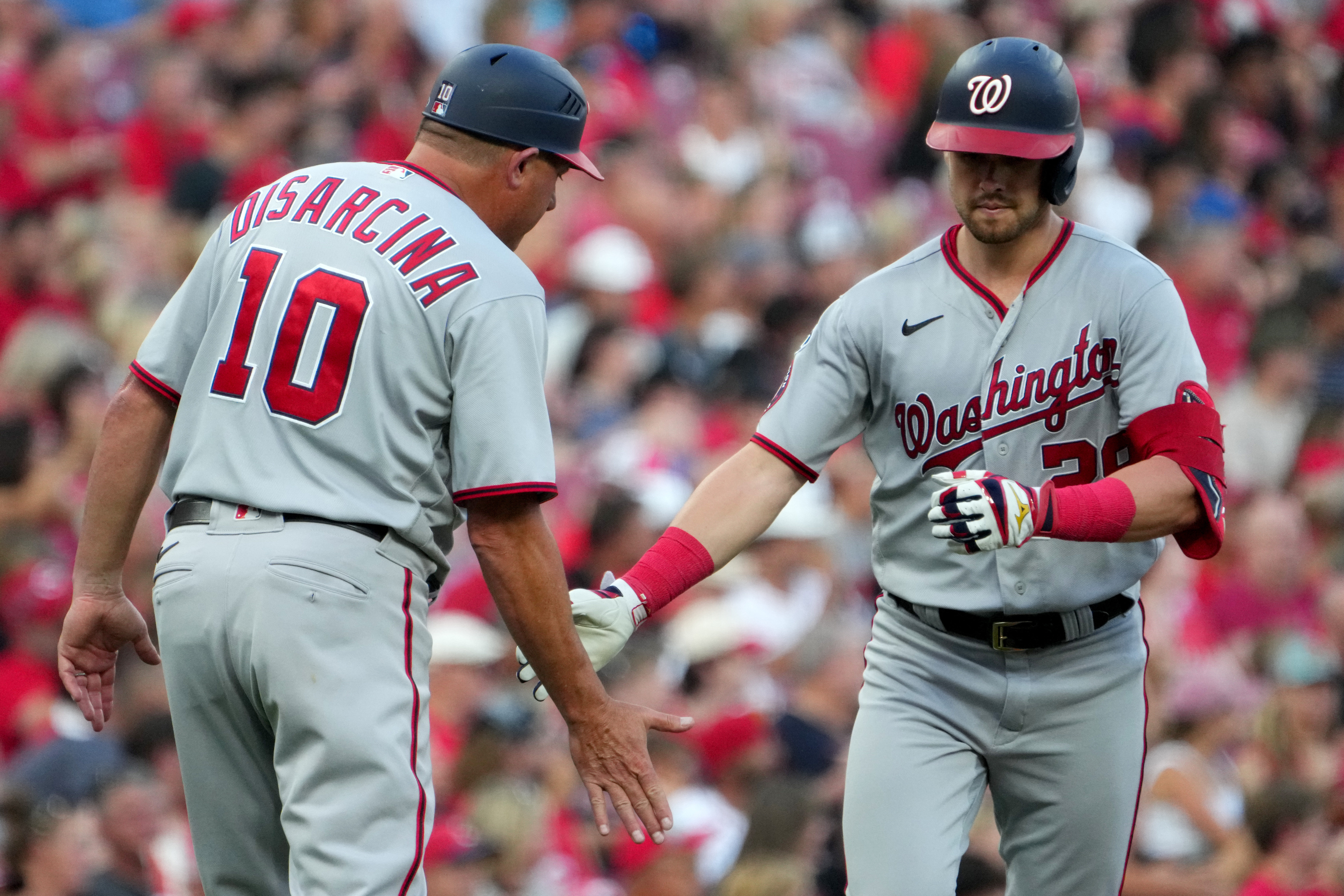 Lane Thomas slugs Nationals past Reds in 10 innings