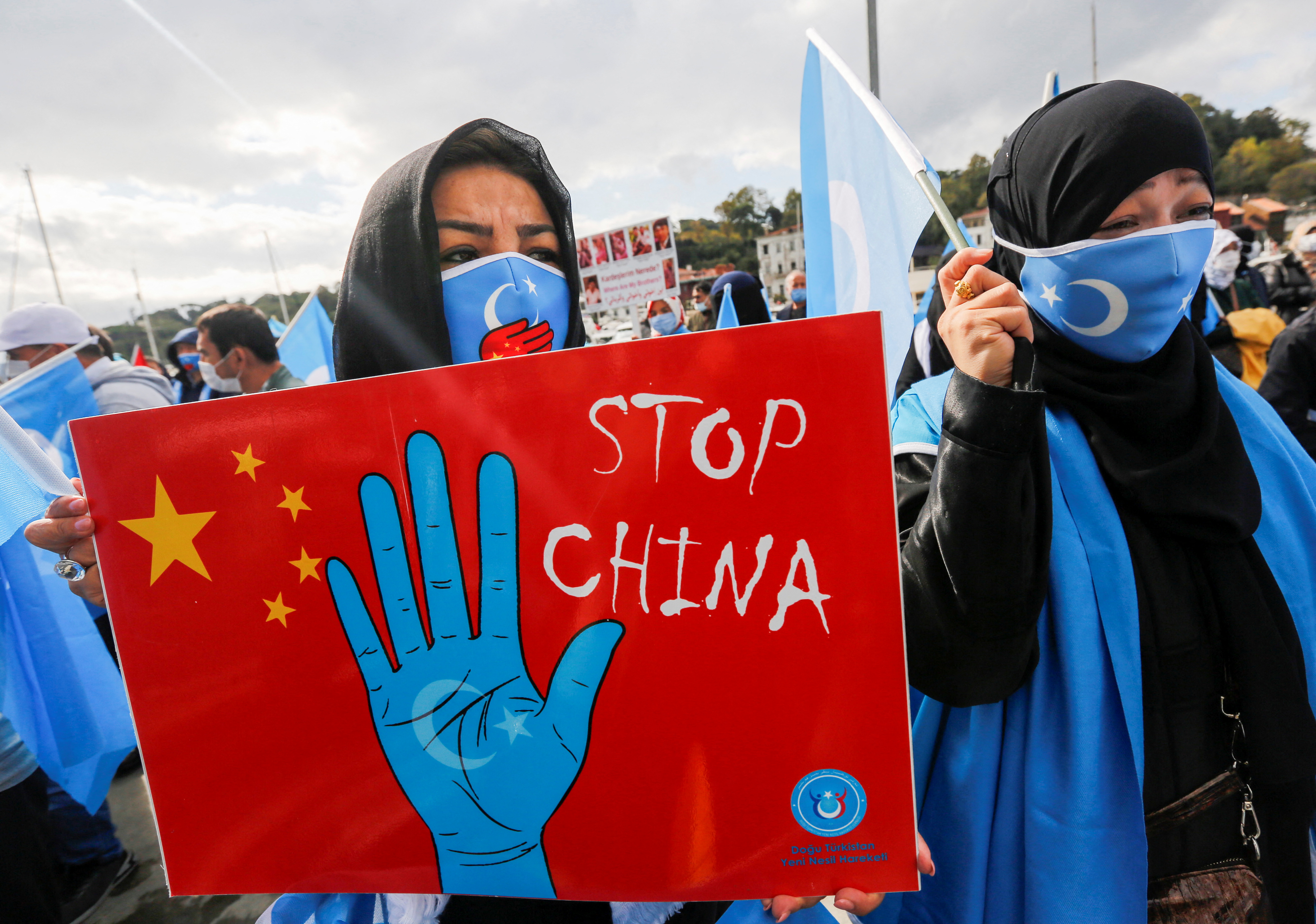 Ethnic Uighur demonstrators take part in a protest against China, in Istanbul