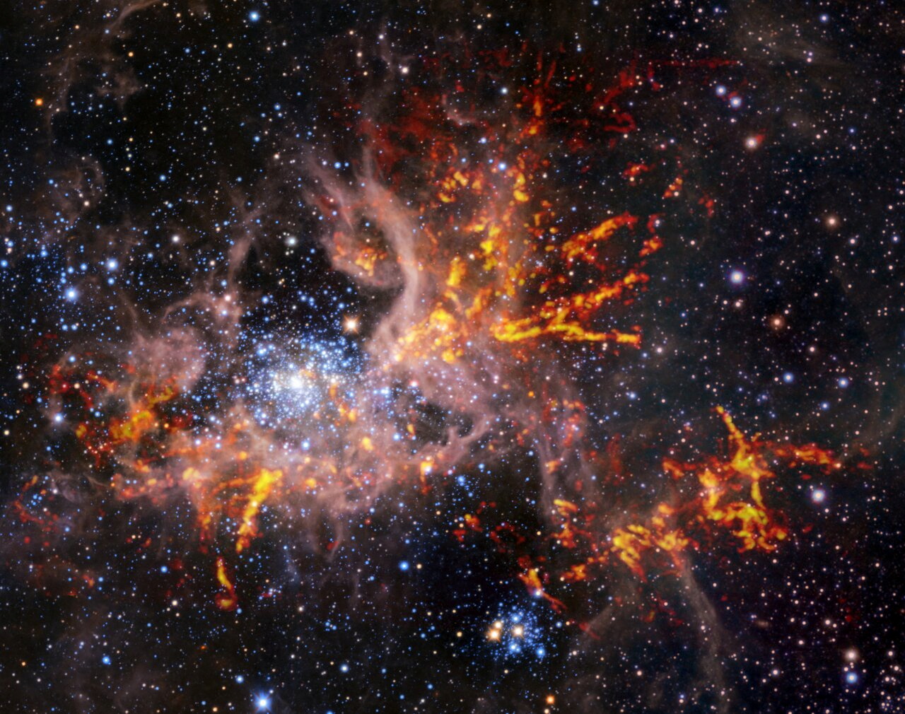 Infrared composite image shows the star-forming region 30 Doradus, known as the Tarantula Nebula