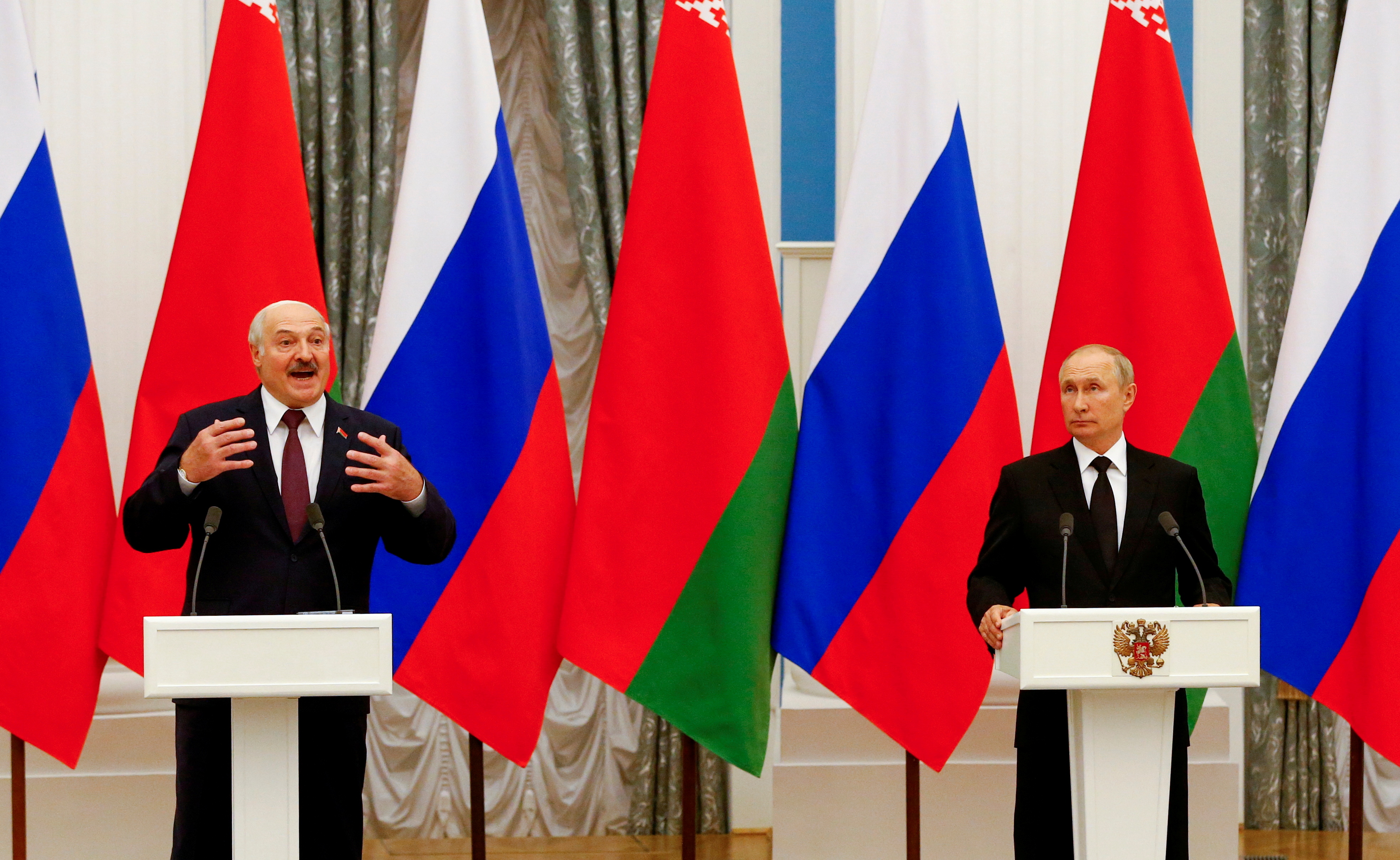 FILE PHOTO: Russian President Putin and Belarusian President Lukashenko attend a news conference in Moscow