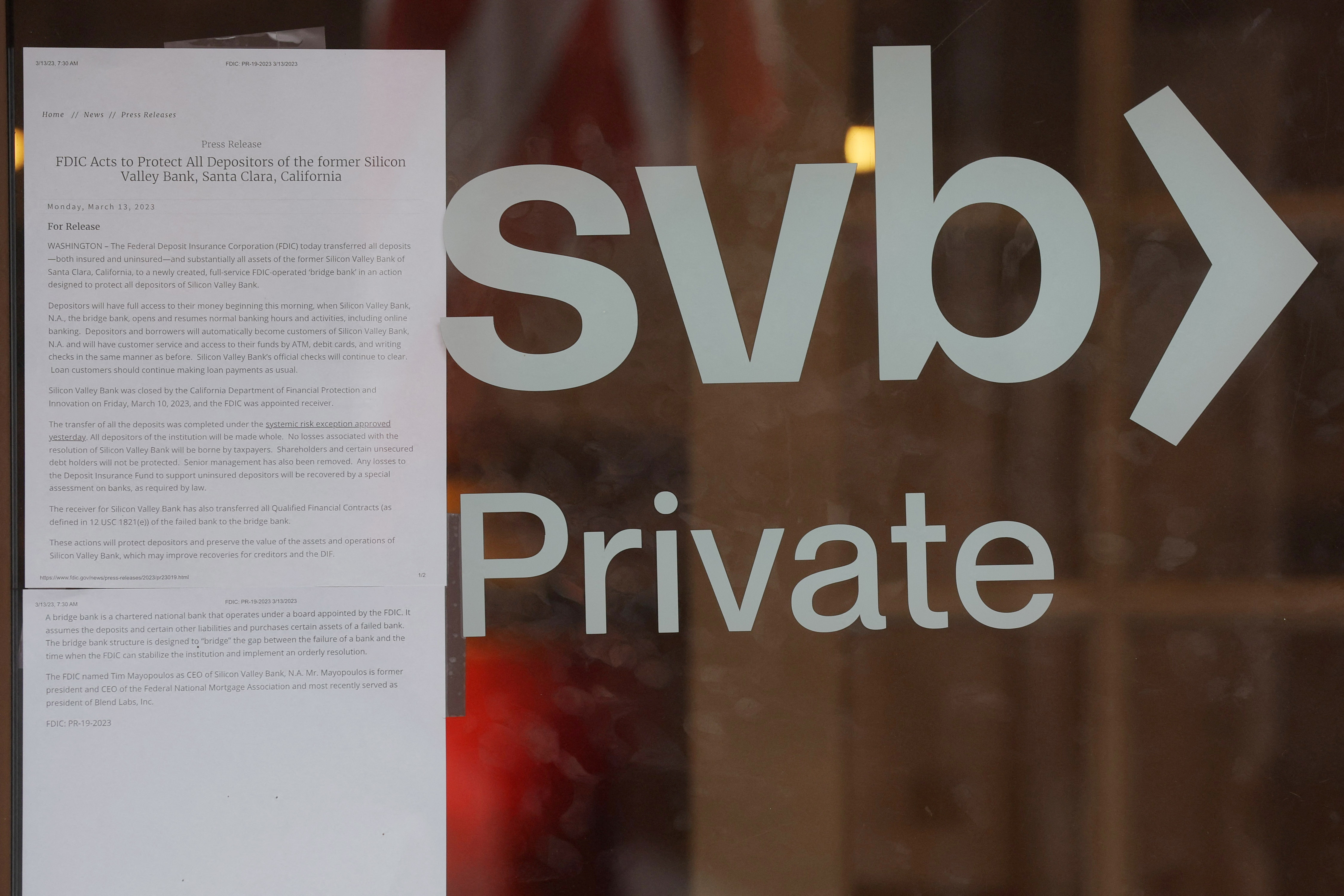 A press release from the (FDIC) is taped to the door of a branch of Silicon Valley Bank in Wellesley