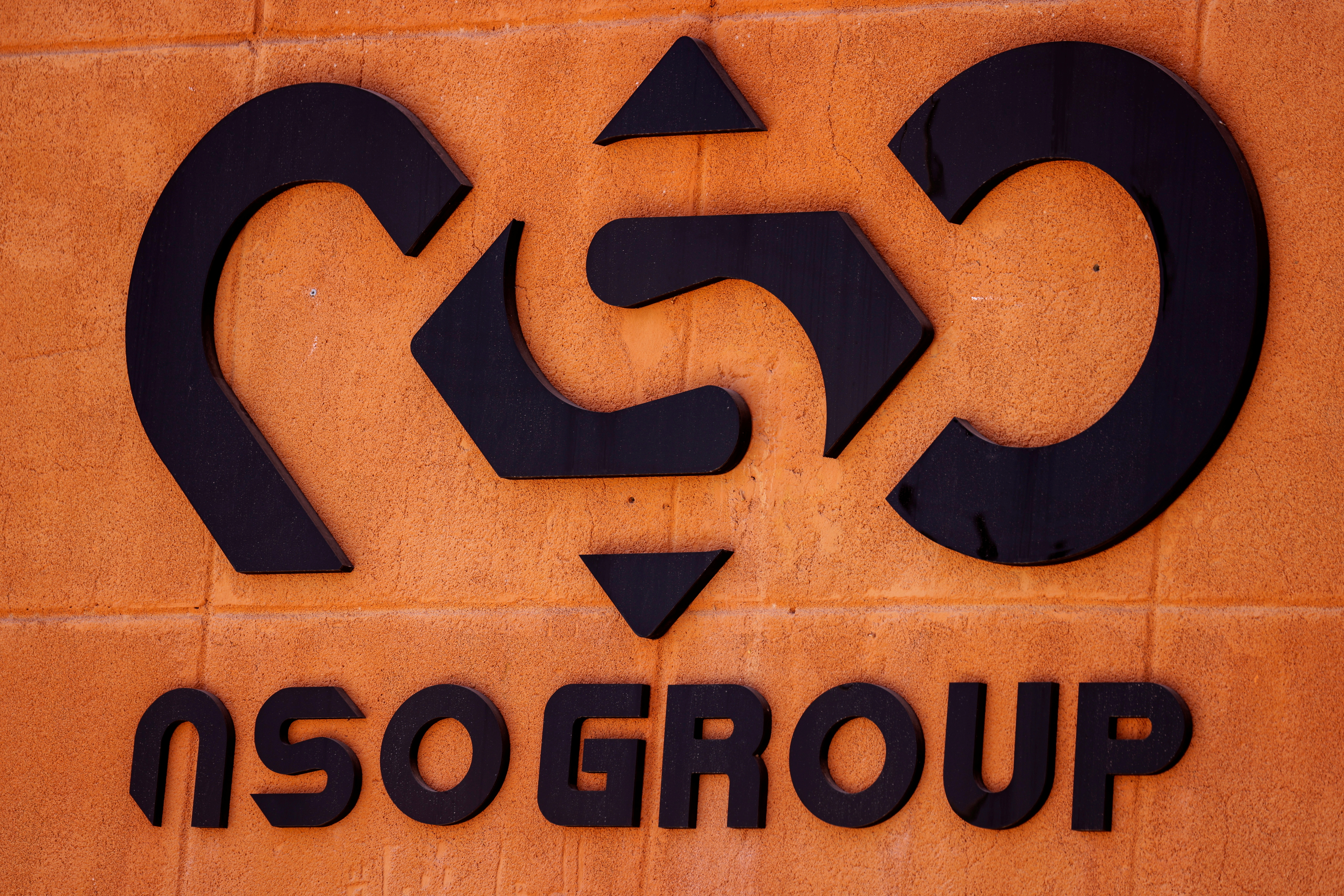 The logo of Israeli cyber firm NSO Group is seen at one of its branches in the Arava Desert, southern Israel July 22, 2021. REUTERS/Amir Cohen/File Photo