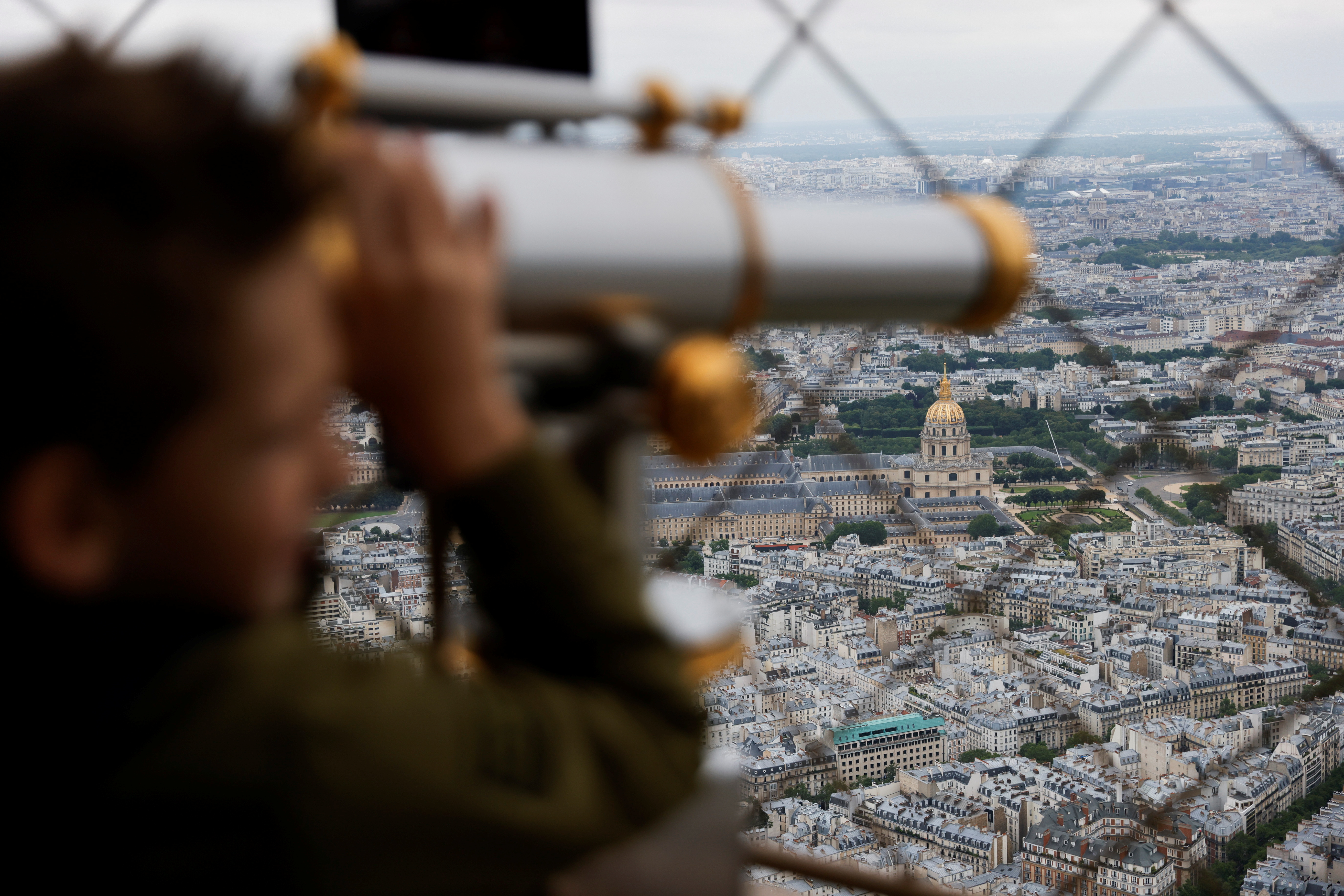 Paris' iconic Eiffel Tower reopens its doors to tourists