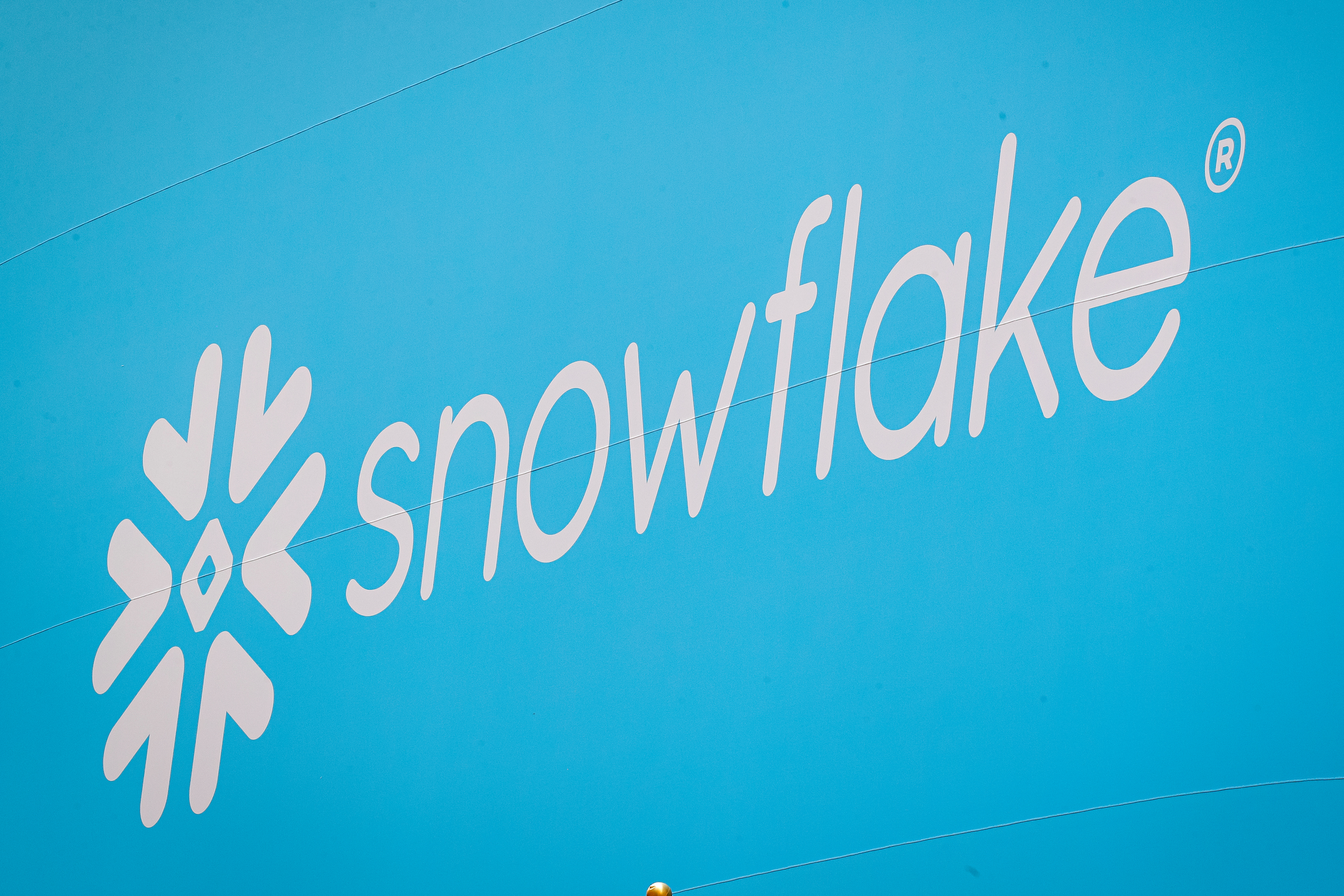 The company logo for Snowflake Inc. is displayed on a banner to celebrate the company's IPO at the NYSE in New York