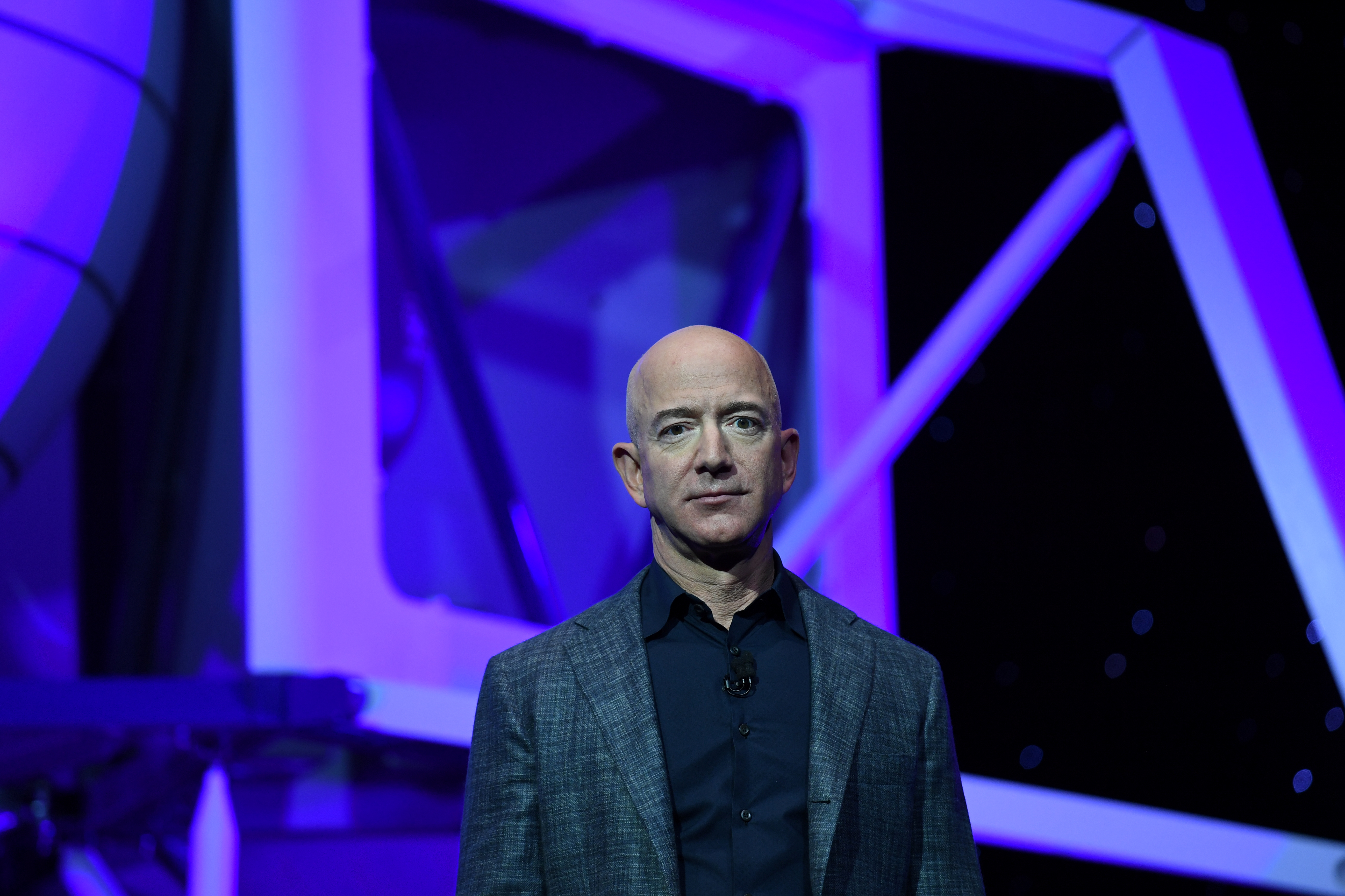 Founder, Chairman, CEO and President of Amazon Jeff Bezos unveils his space company Blue Origin's space exploration lunar lander rocket called Blue Moon during an unveiling event in Washington