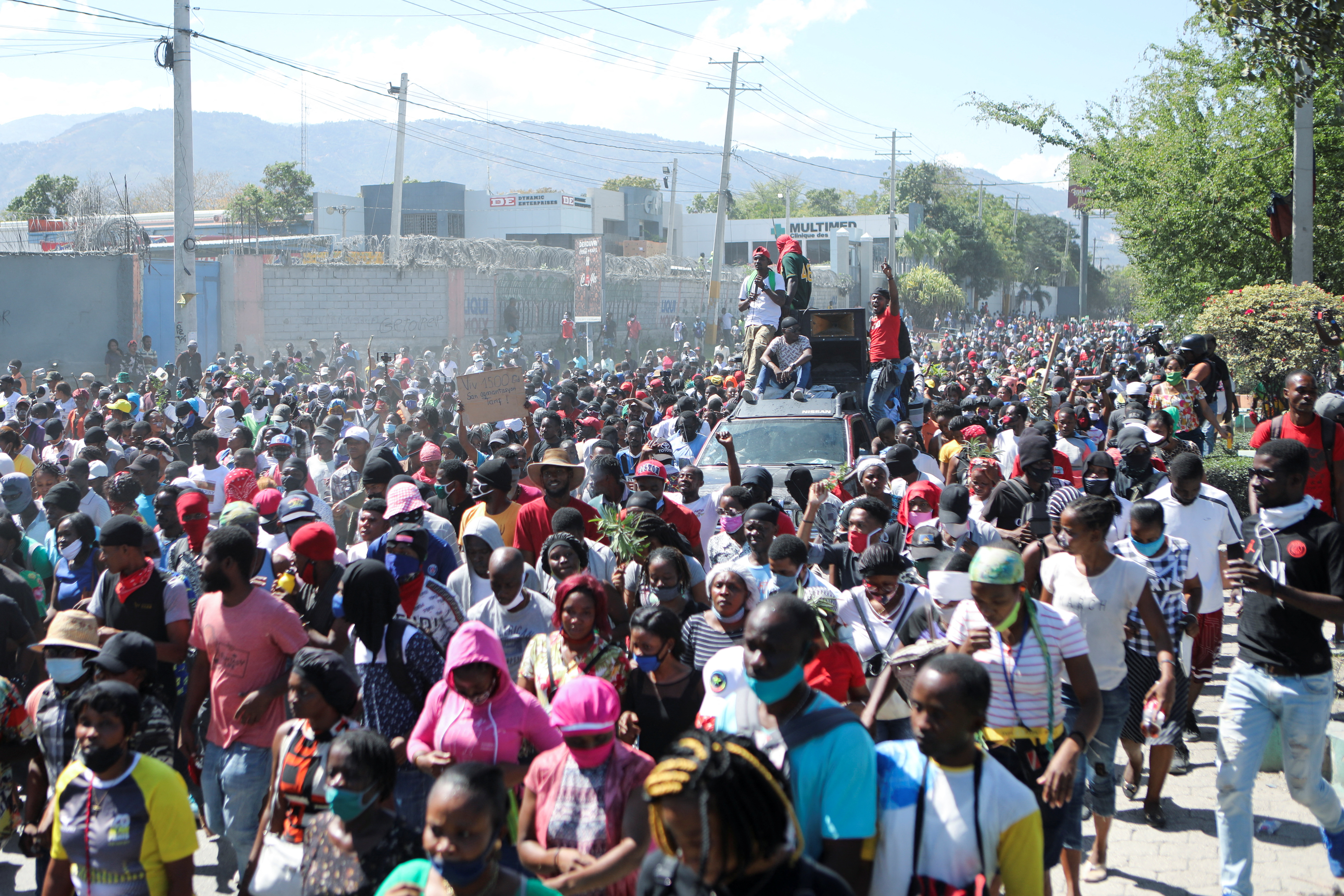 Haitians demand higher wages in protest where journalist is killed, in Port-au-Prince