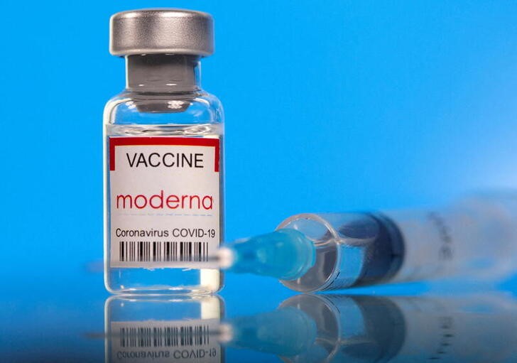 Picture illustration of a vial labelled with the Moderna coronavirus disease (COVID-19) vaccine
