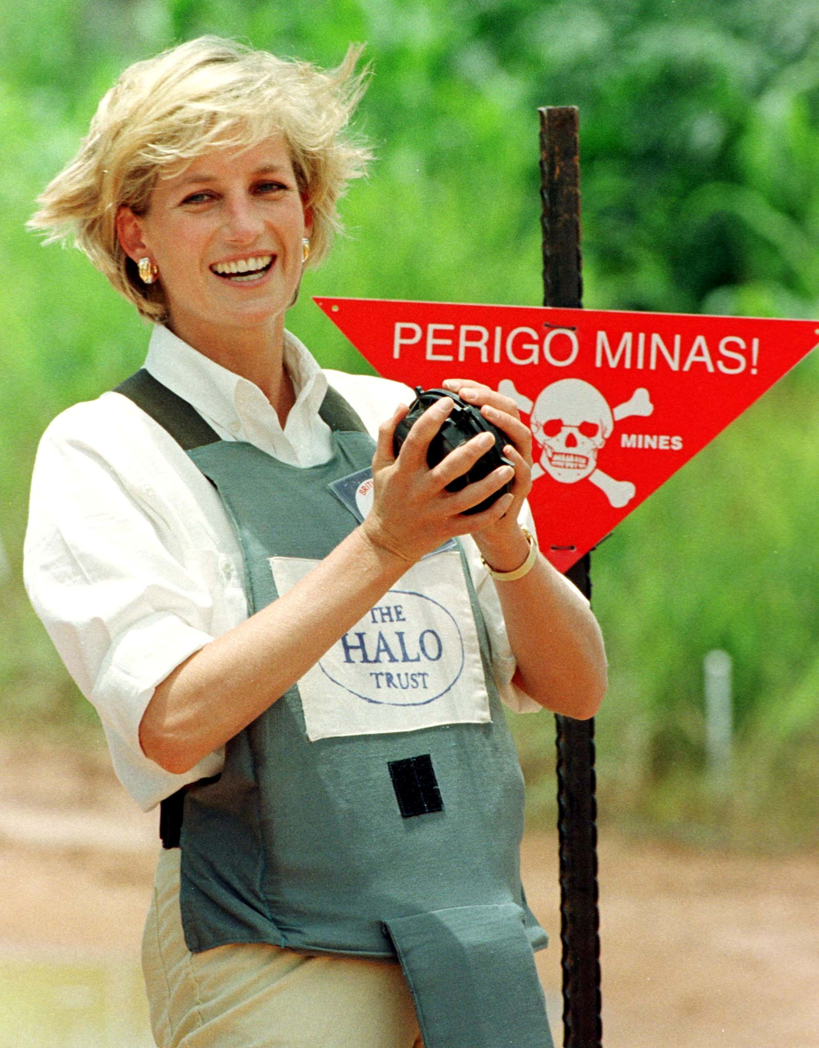 Diana, Princess of Wales holds a landmine in one of the safety corridors of the landmine field in Huambo, Angola