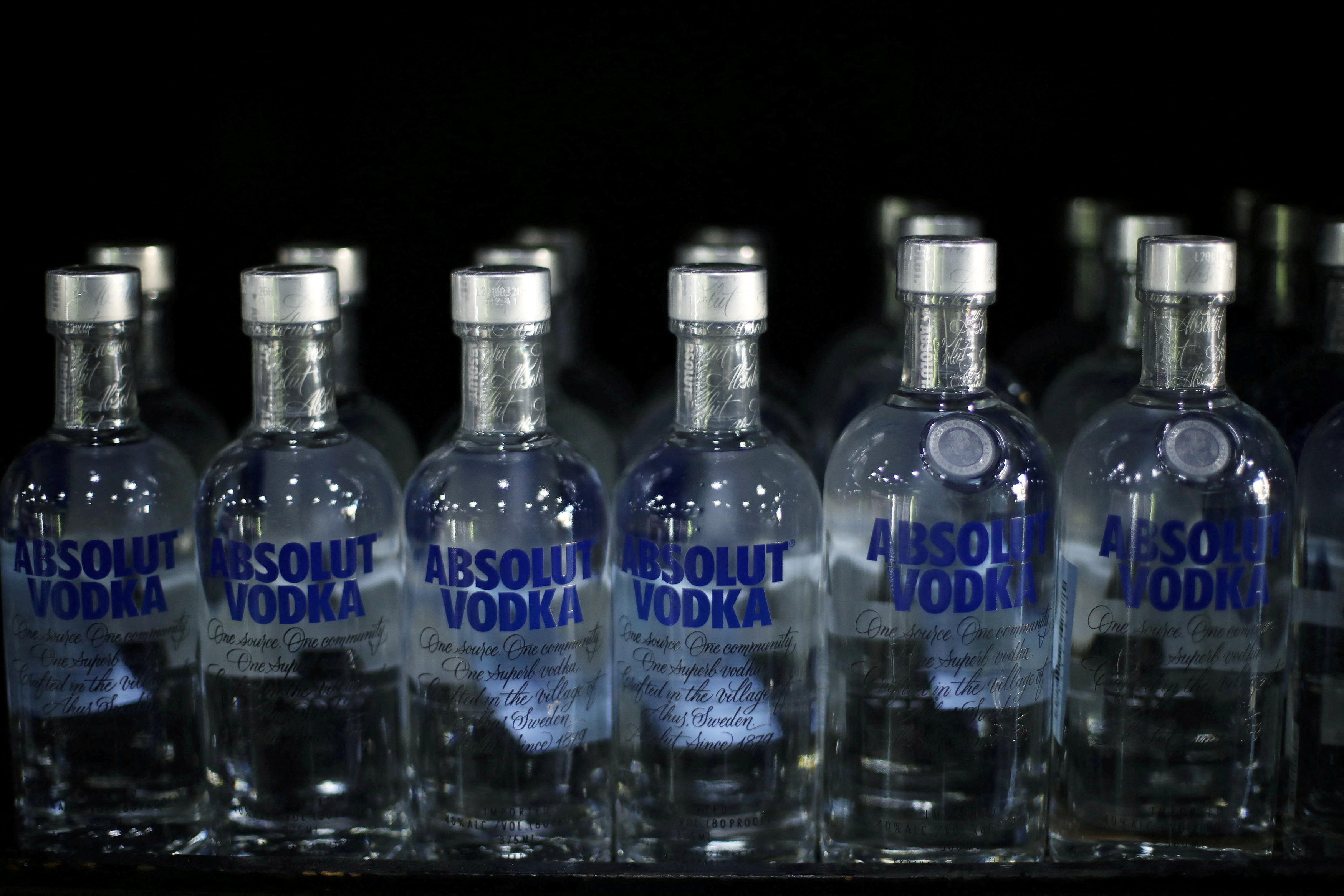 Absolut vodka bottles are seen displayed, amid the outbreak of the coronavirus disease (COVID-19), at a liquor store in Amman