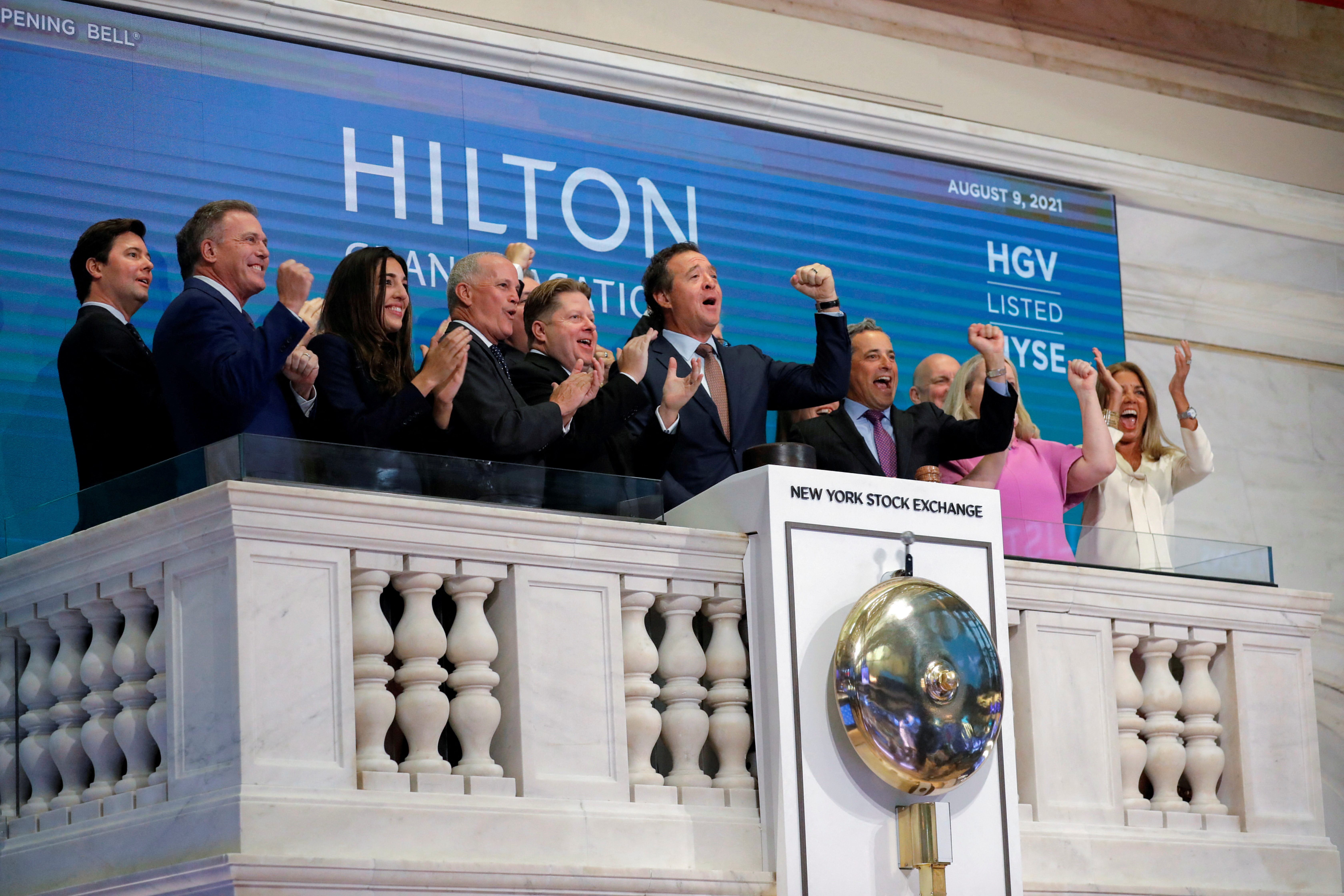 Mark Wang, President and CEO of Hilton Grand Vacations rings the opening bell at the New York Stock Exchange (NYSE) in Manhattan, New York City