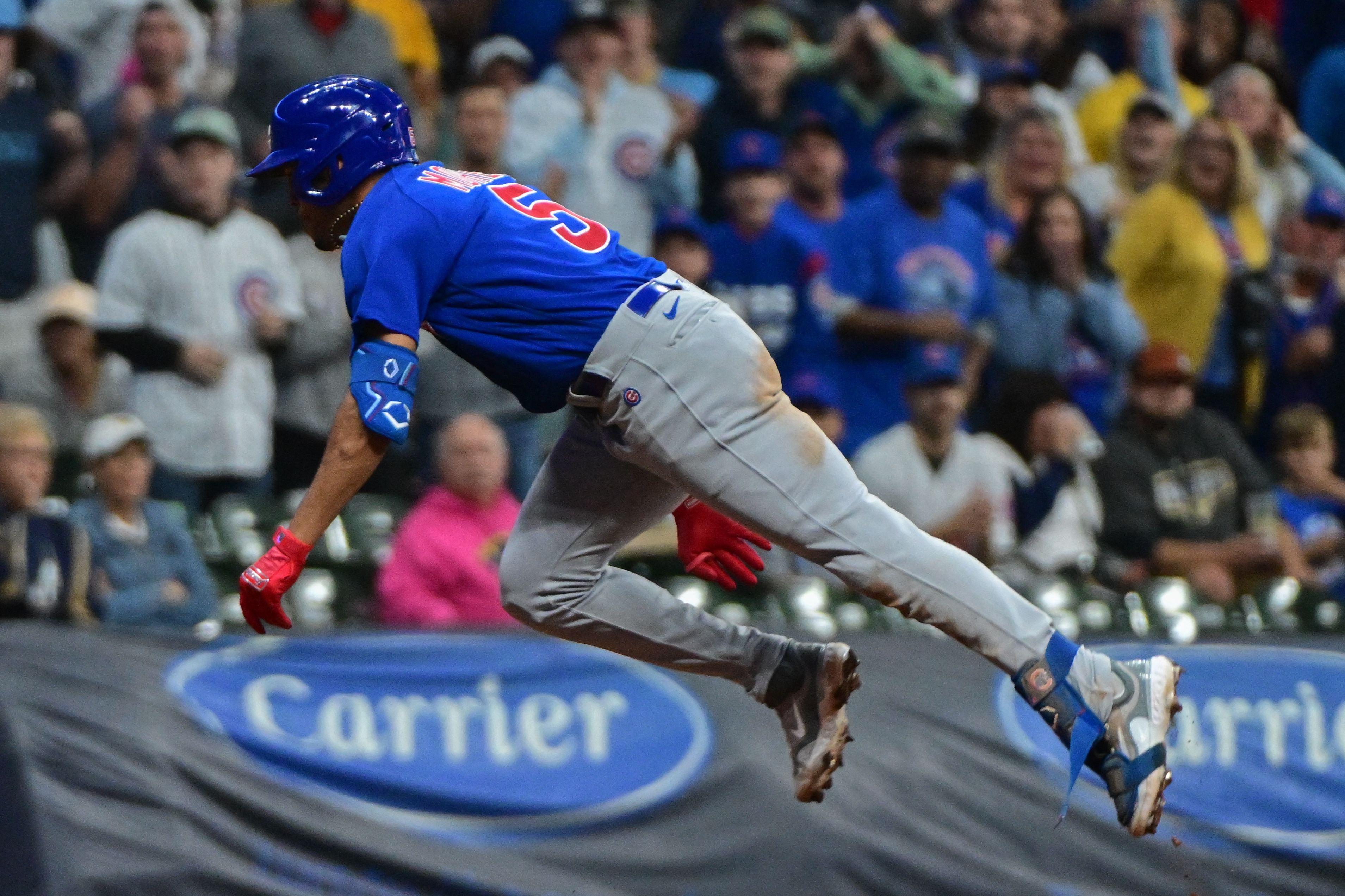 Cubs' postseason hopes take hit in 10-inning loss to Brewers