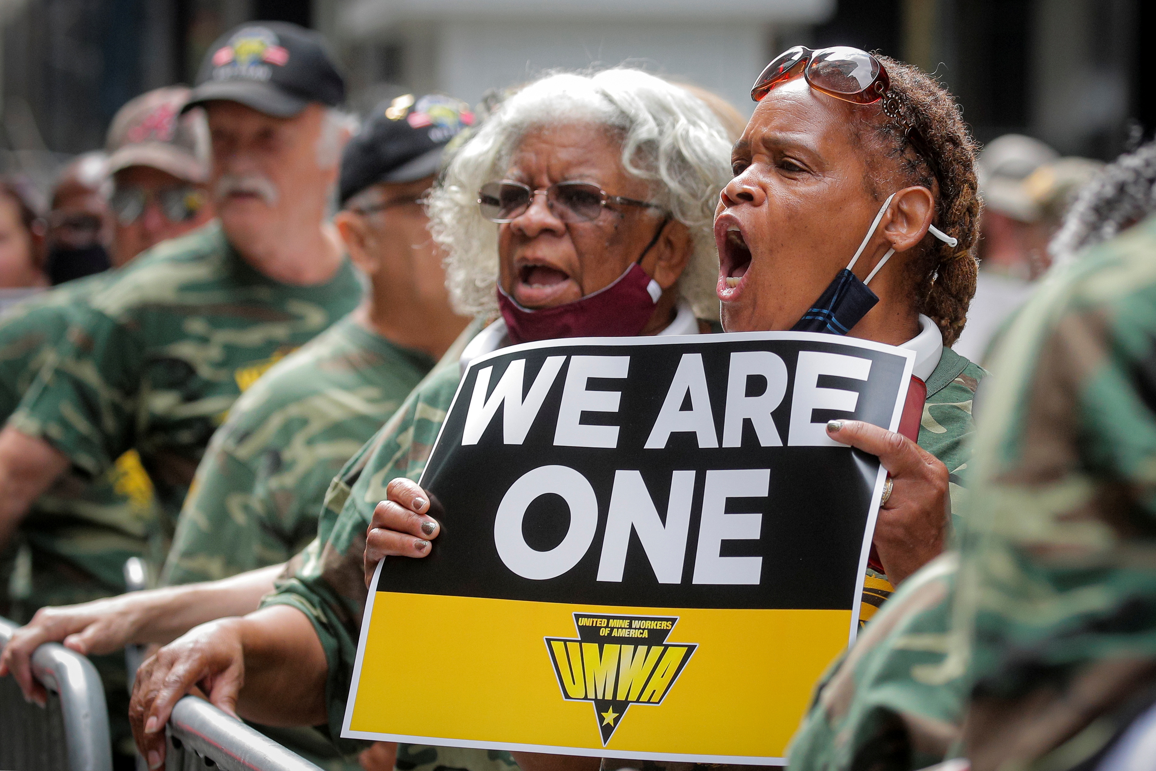 Members of UMWA and other labor leaders picket outside BlackRock's Headquarters in New York