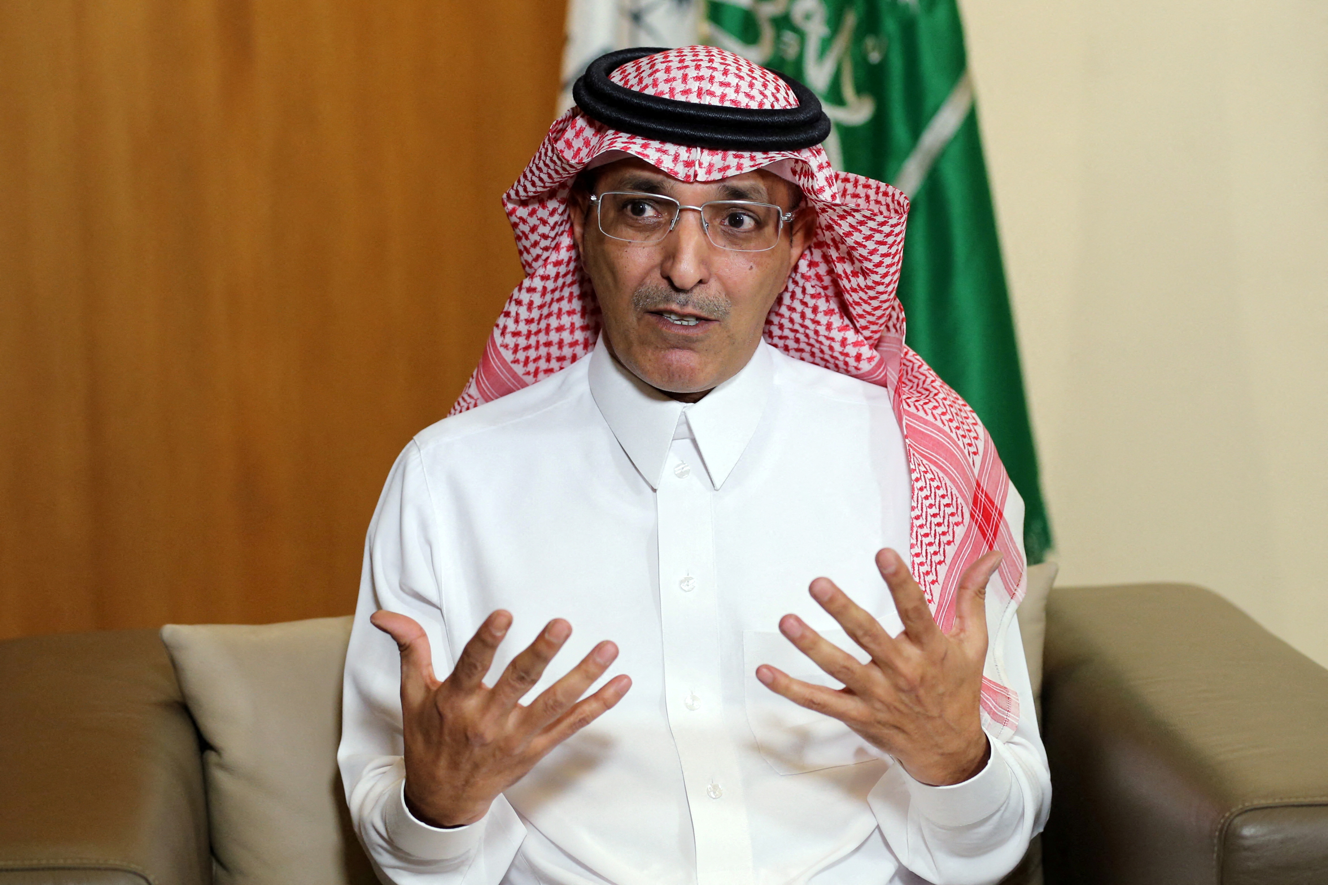 Saudi Minister of Finance Mohammed al-Jadaan gestures during an interview with Reuters at the Ministry of Finance in Riyadh
