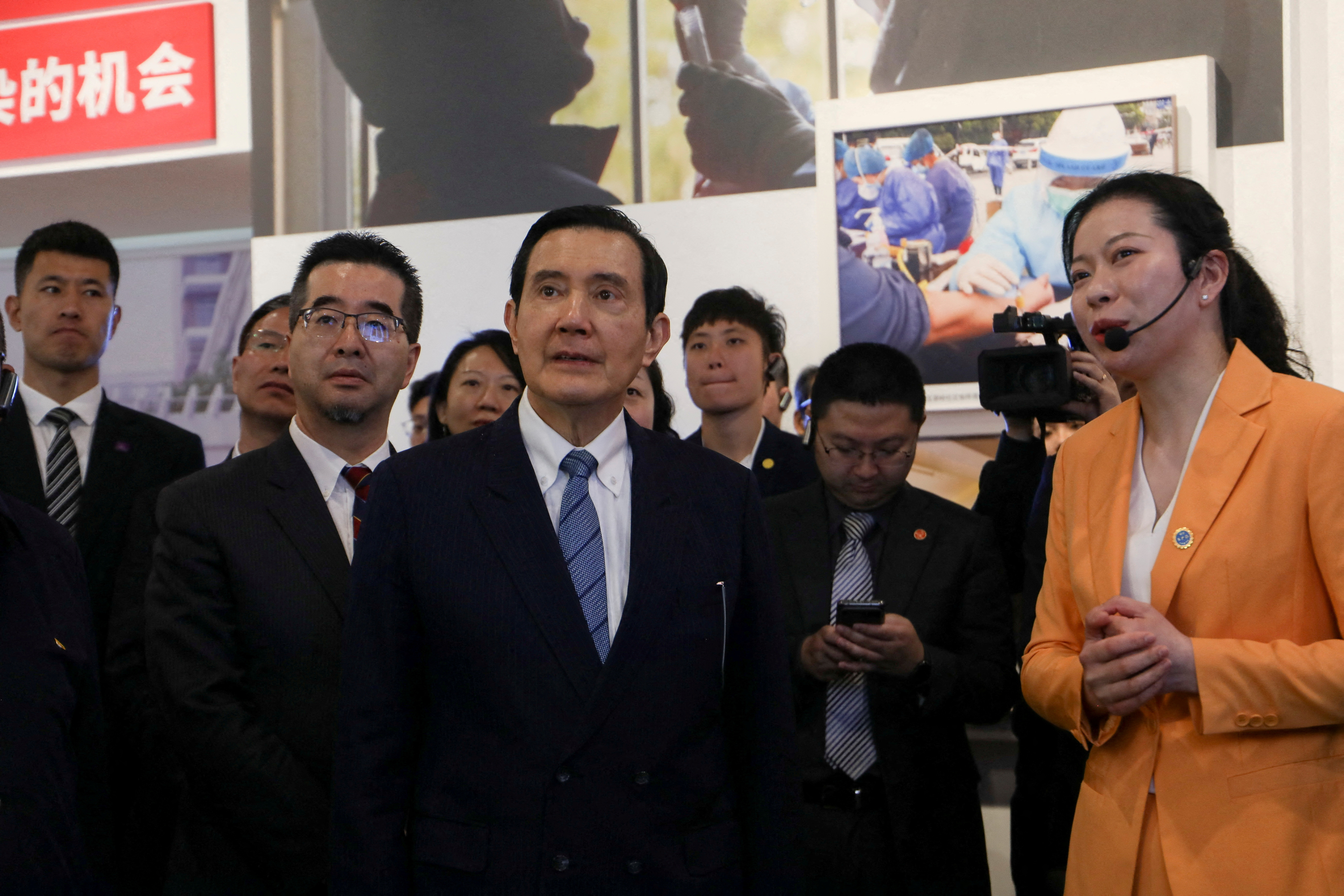 Former Taiwanese president Ma Ying-jeou visits an exhibition on how China fought against the coronavirus disease (COVID-19), in Wuhan