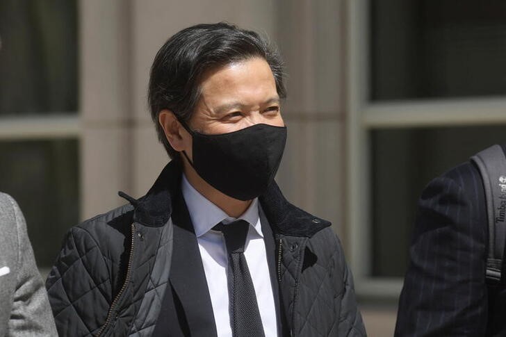 Ex-Goldman Sachs banker Roger Ng exits the United States Courthouse after being found guilty in Brooklyn, New York