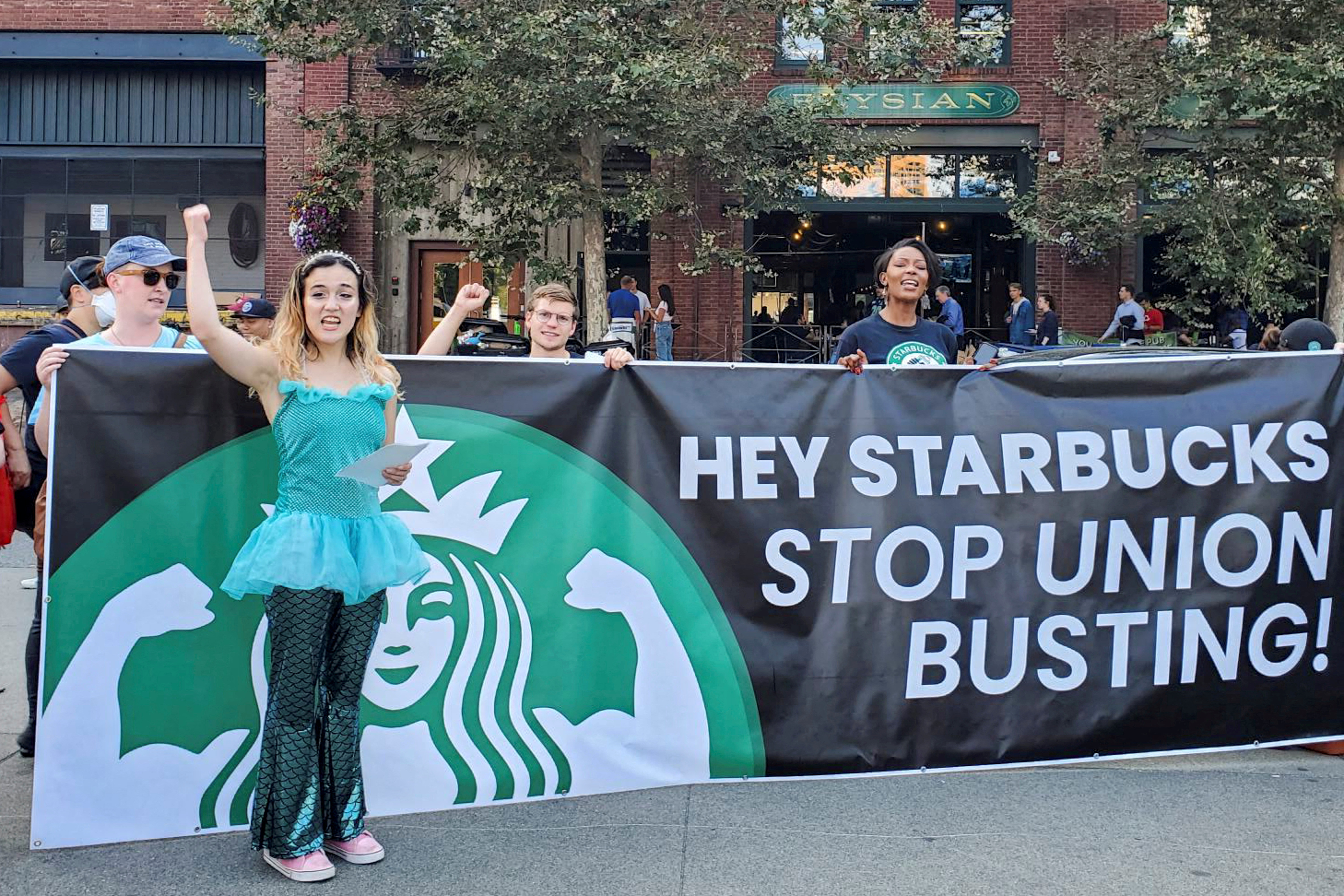 Starbucks employees who support unionization protest ahead of Investor Day, in Seattle