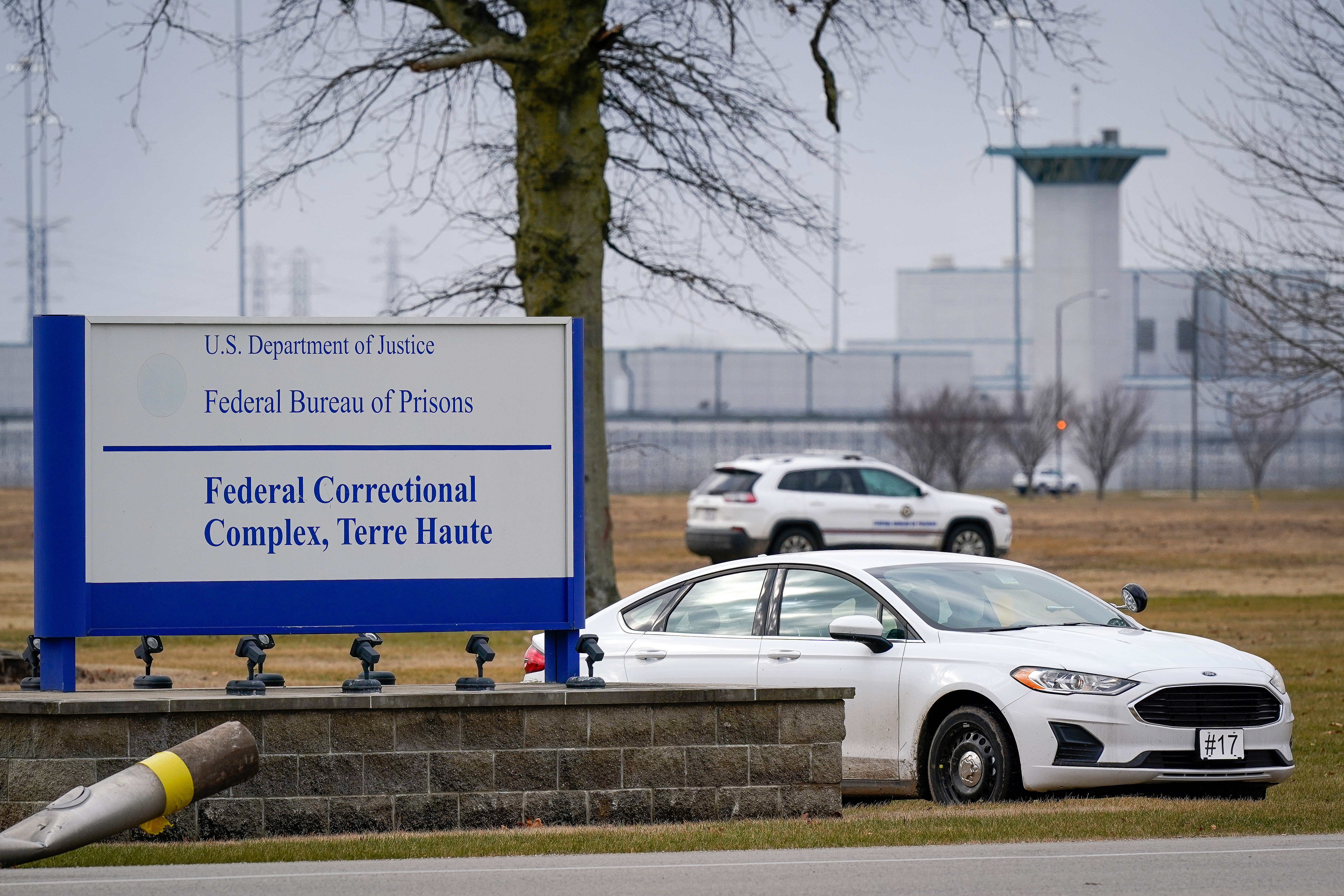 Prison officials patrol around the United States Penitentiary at the Federal Correctional Complex in Terre Haute